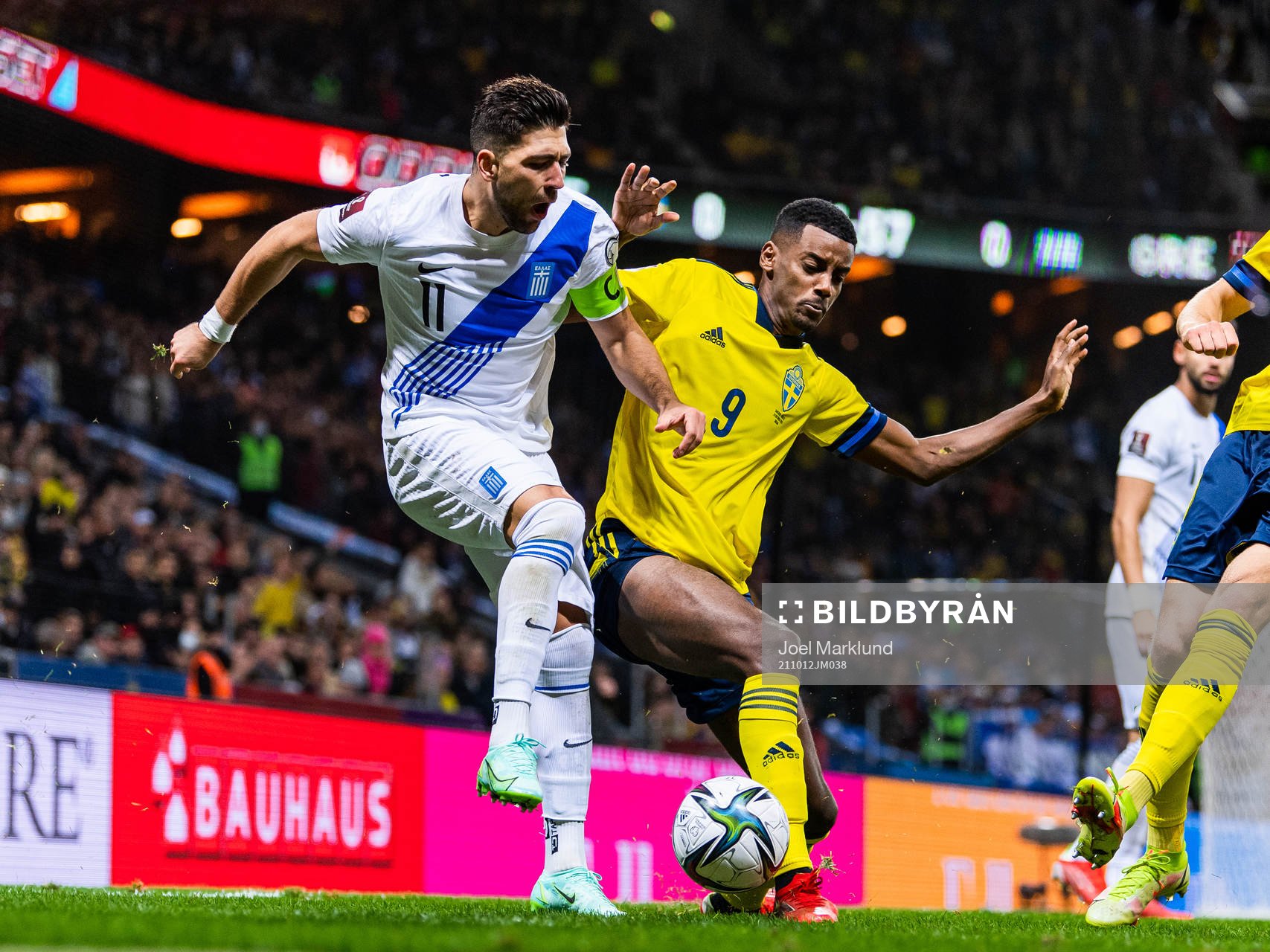 Tasos Bakasetas of Greece and Alexander Isak of Sweden