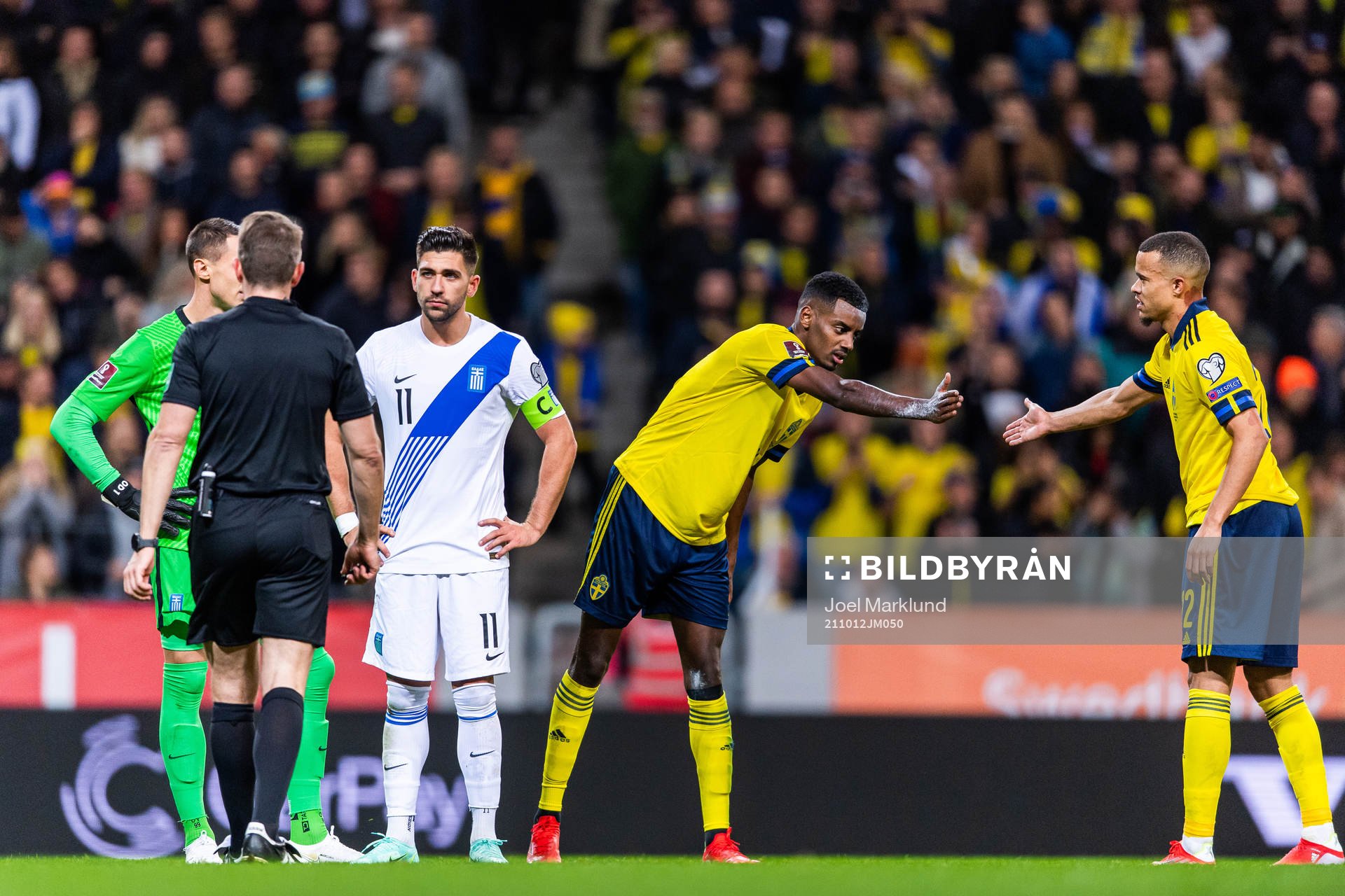 Alexander Isak and Robin Quaison of Sweden celebrate the