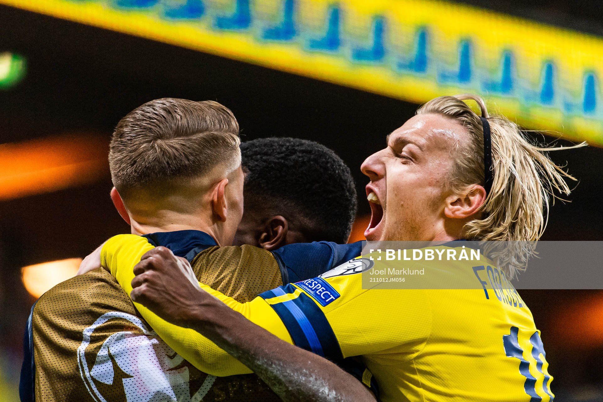 Alexander Isak celebrates with Emil Forsberg of Sweden