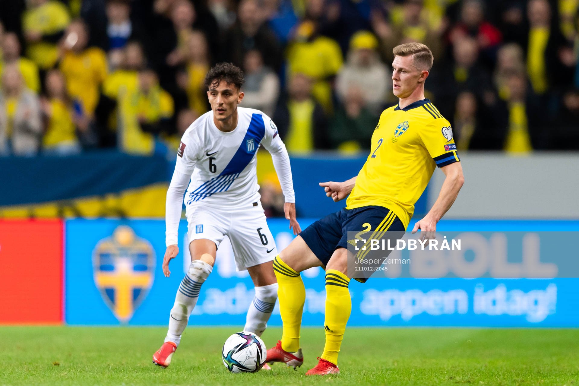 Dimitris Giannoulis of Greece and Emil Krafth of Sweden