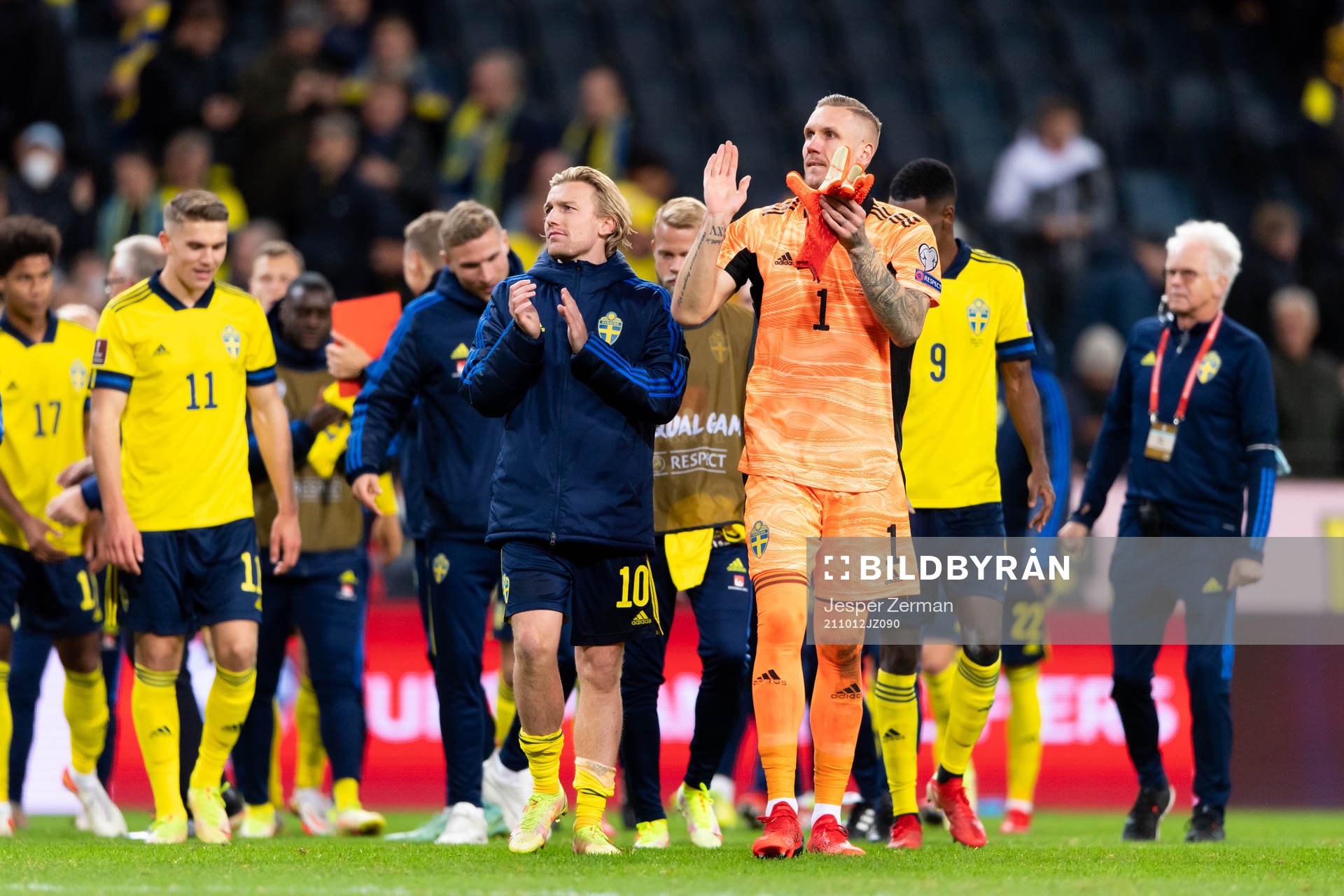Emil Forsberg and goalkeeper Robin Olsen celebrate