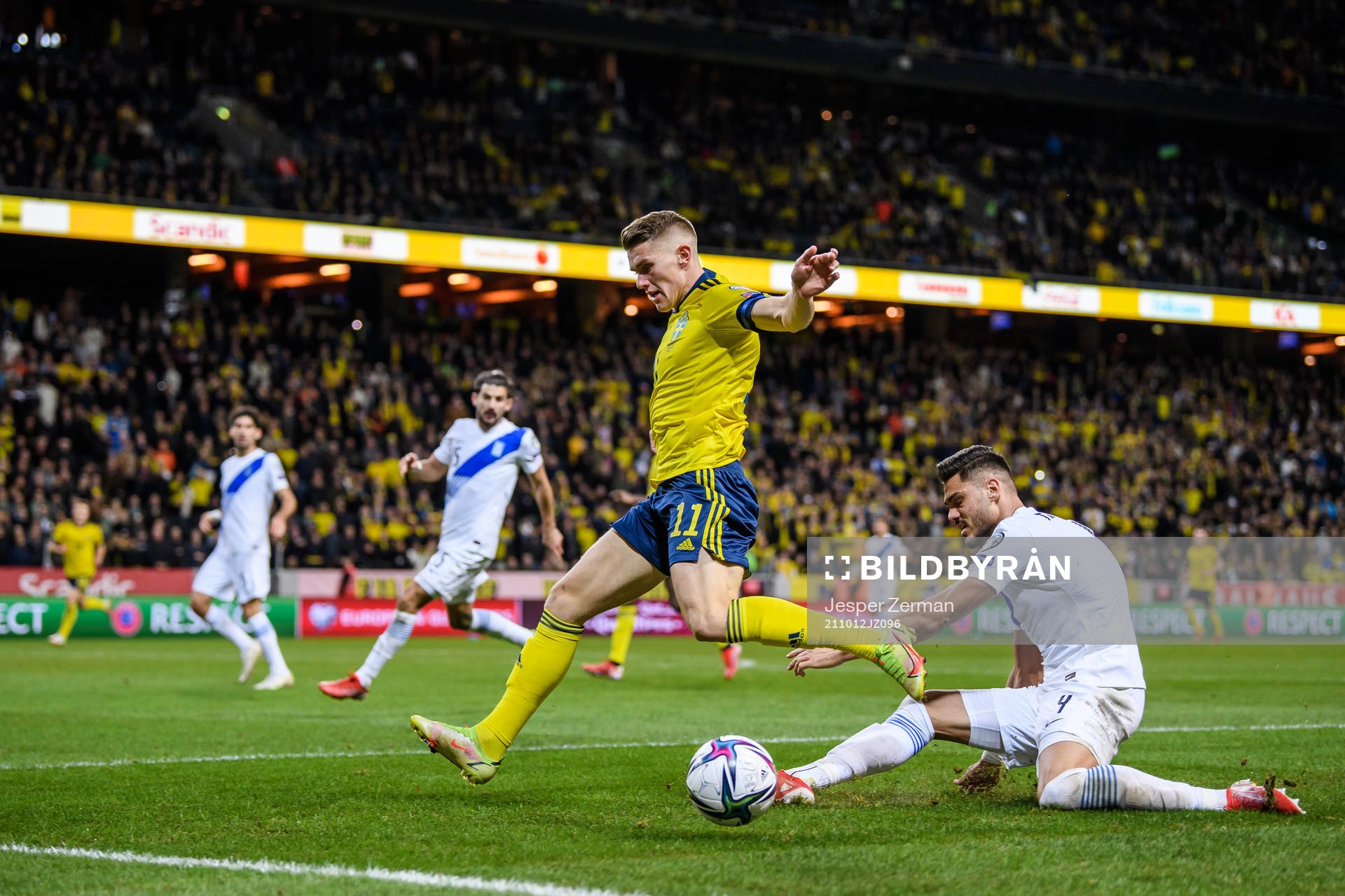Viktor Gyökeres of Sweden and Konstantinos Mavropanos of