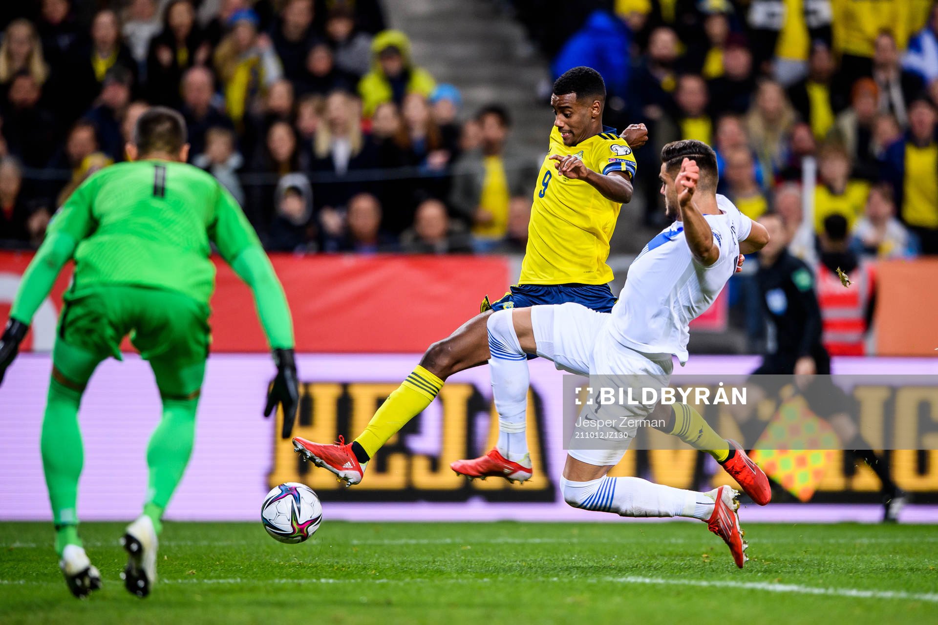 Alexander Isak of Sweden and Konstantinos Mavropanos of