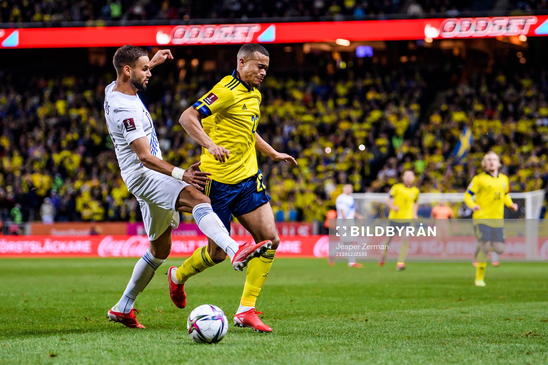 Pantelis Hatzidiakos of Greece and Robin Quaison of Sweden