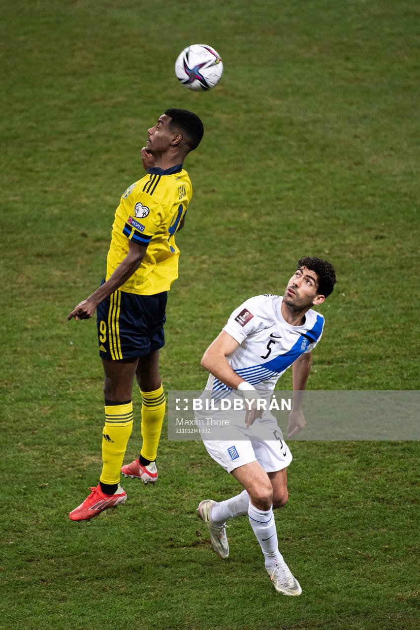 Alexander Isak of Sweden and Andreas Bouchalakis of Greece
