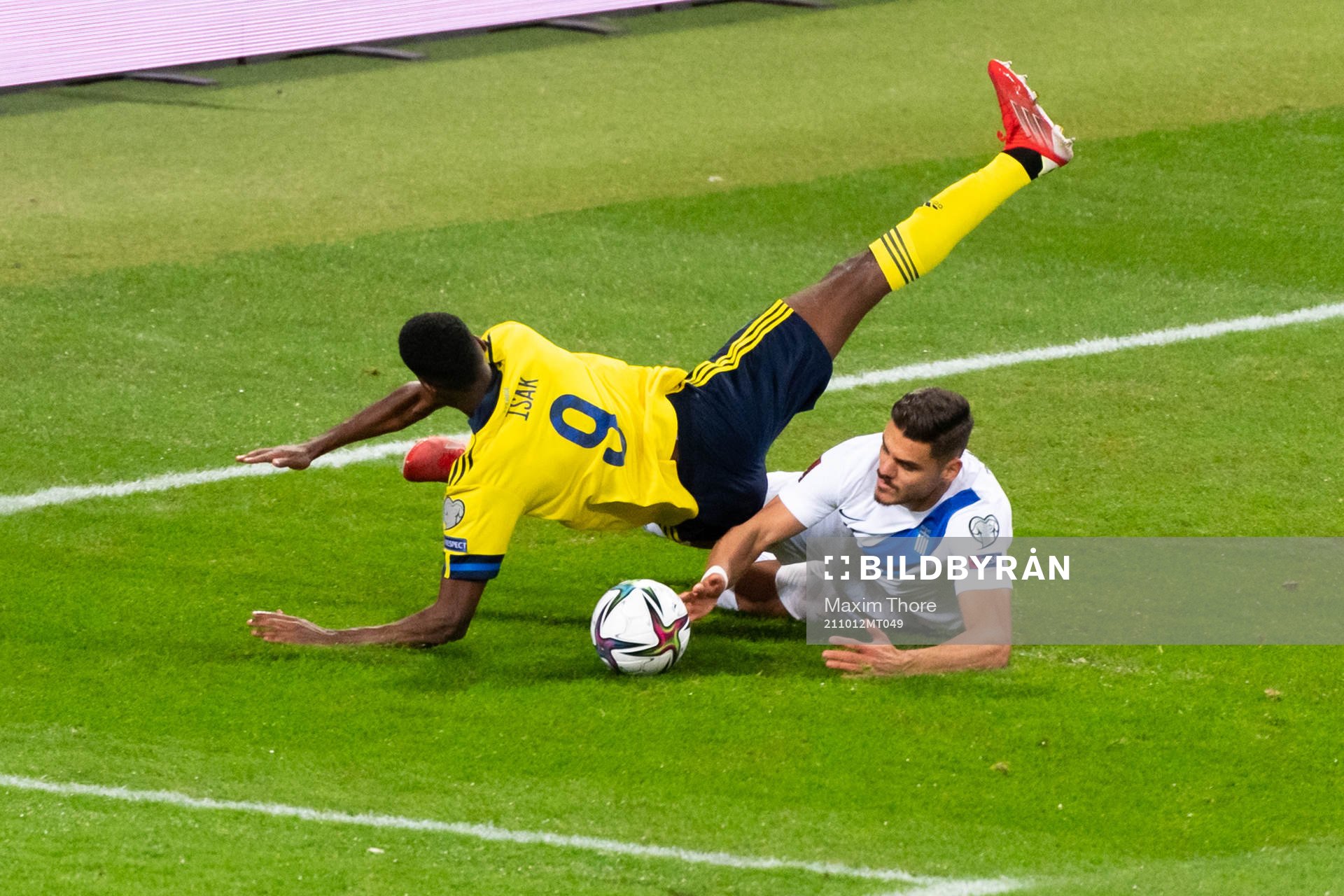 Alexander Isak of Sweden in action with  Konstantinos