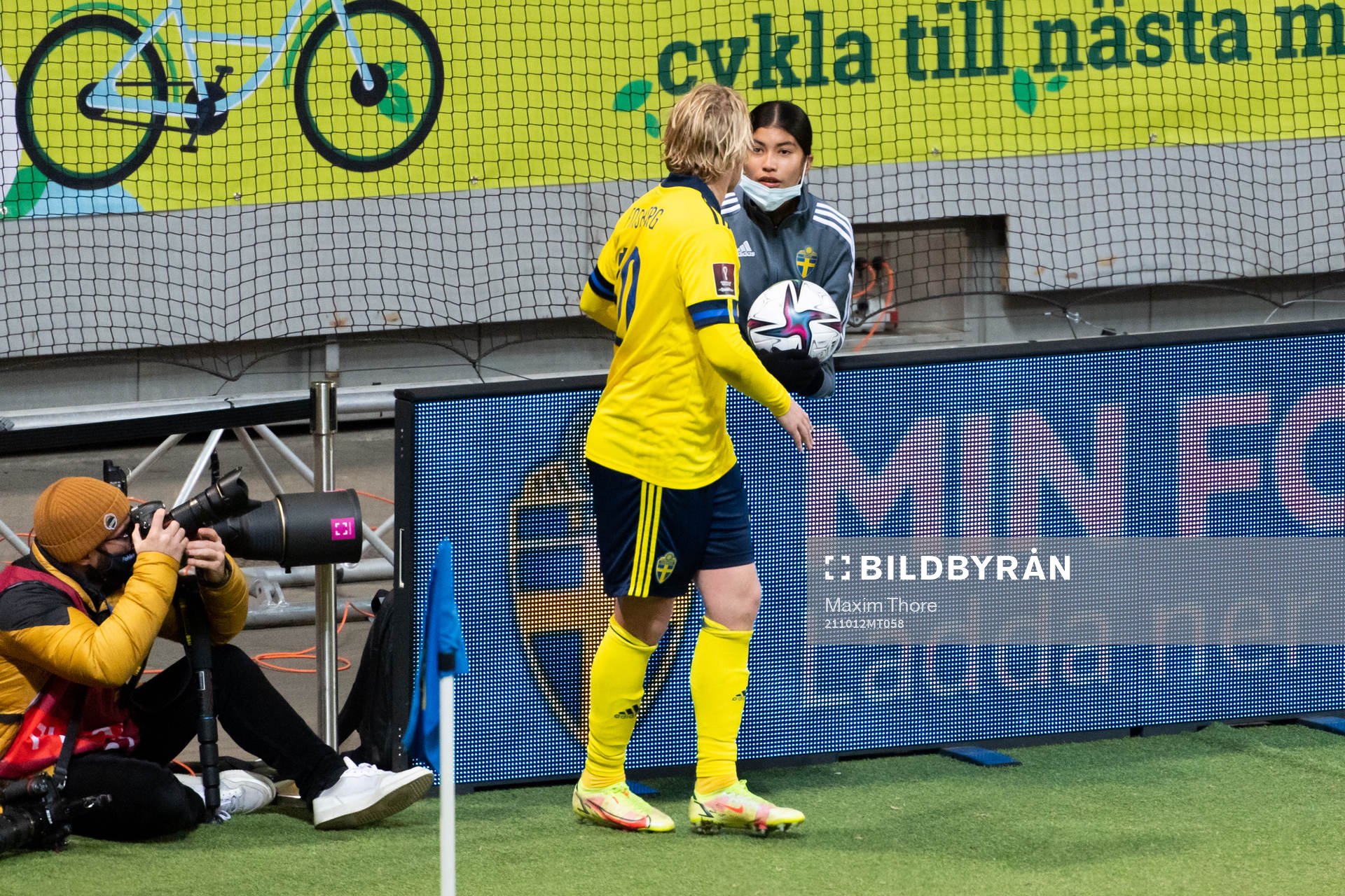 Emil Forsberg of Sweden talks to a ball girl