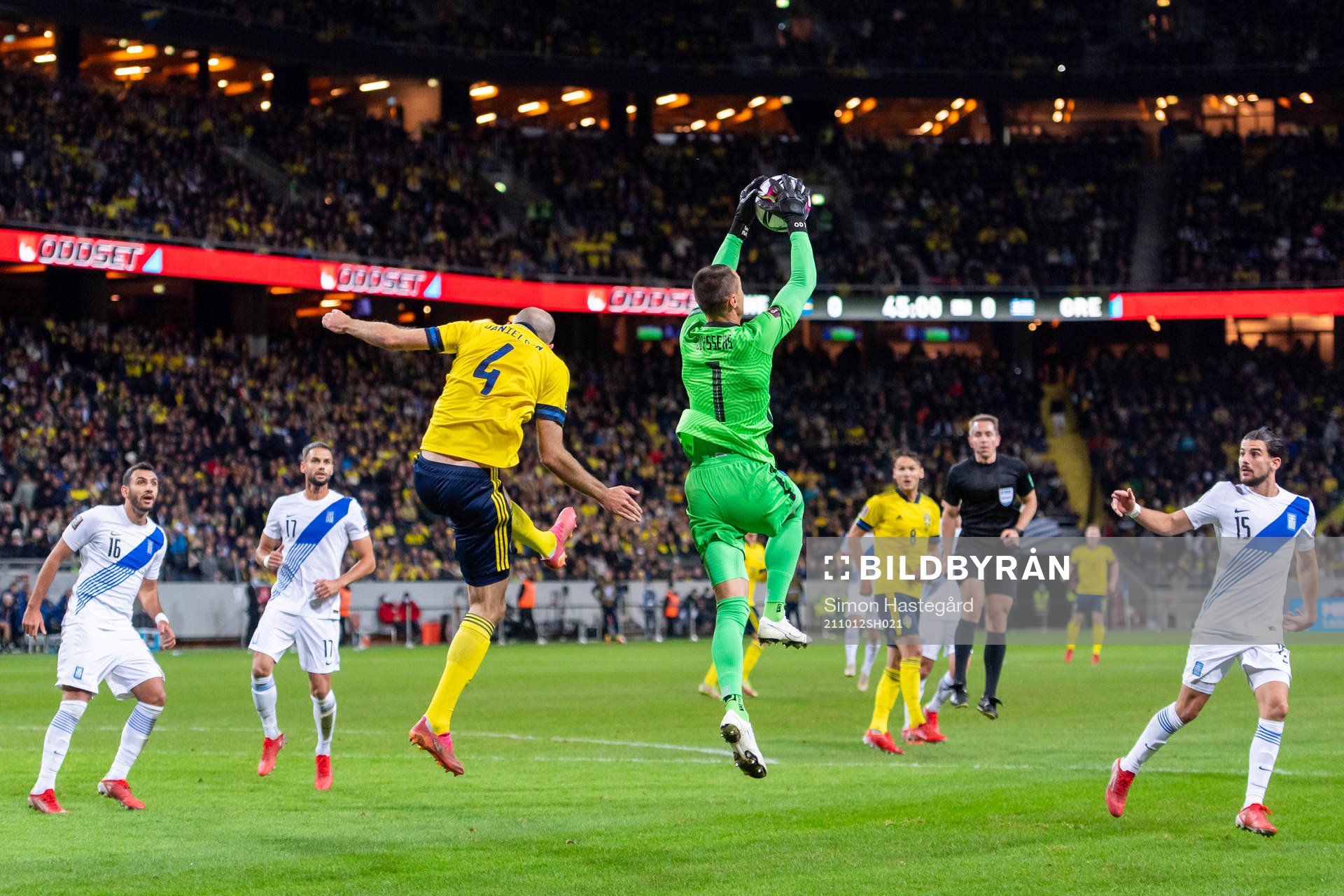 Marcus Danielson of Sweden and goalkeeper Odisseas