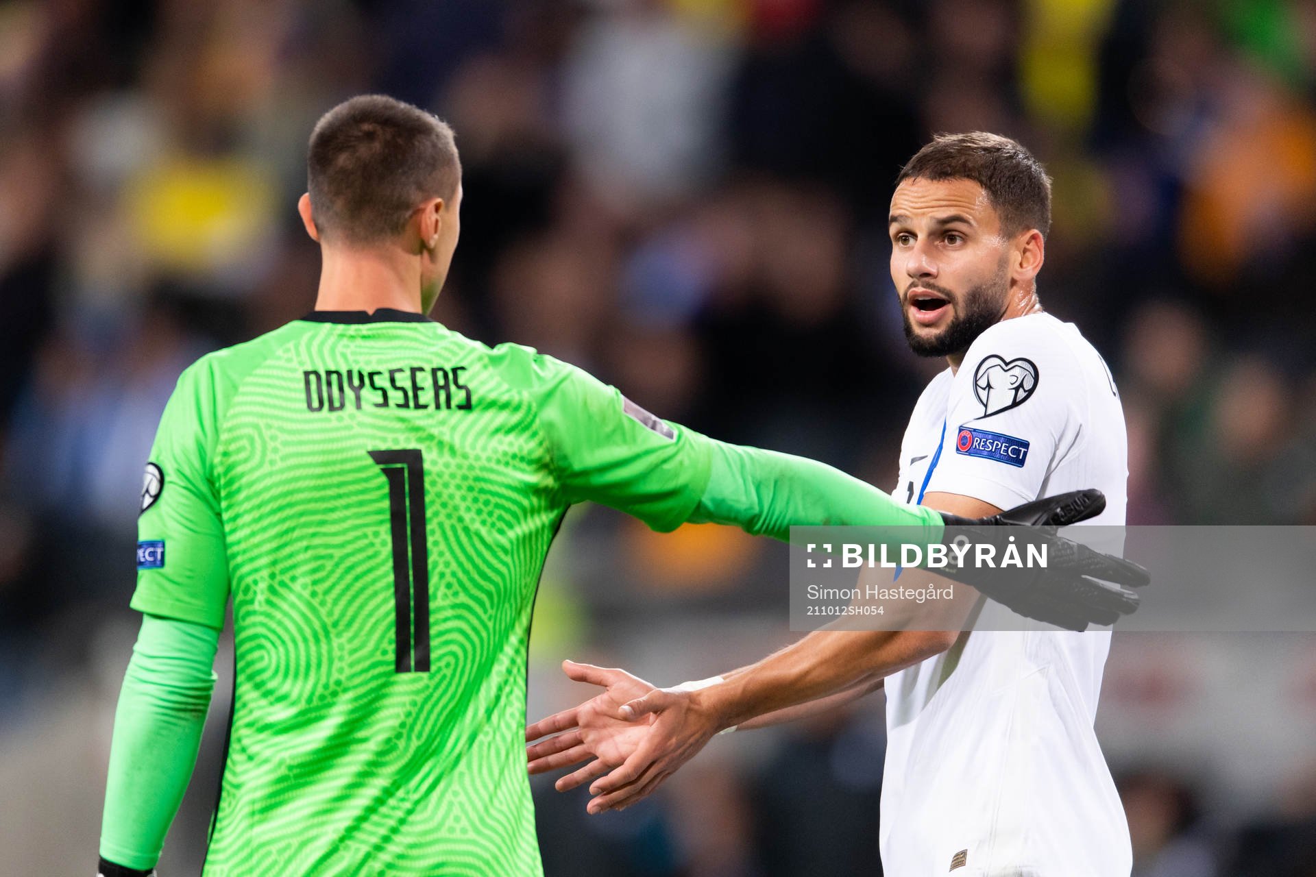 Goalkeeper Odisseas Vlachidimos and Tasos Bakasetas