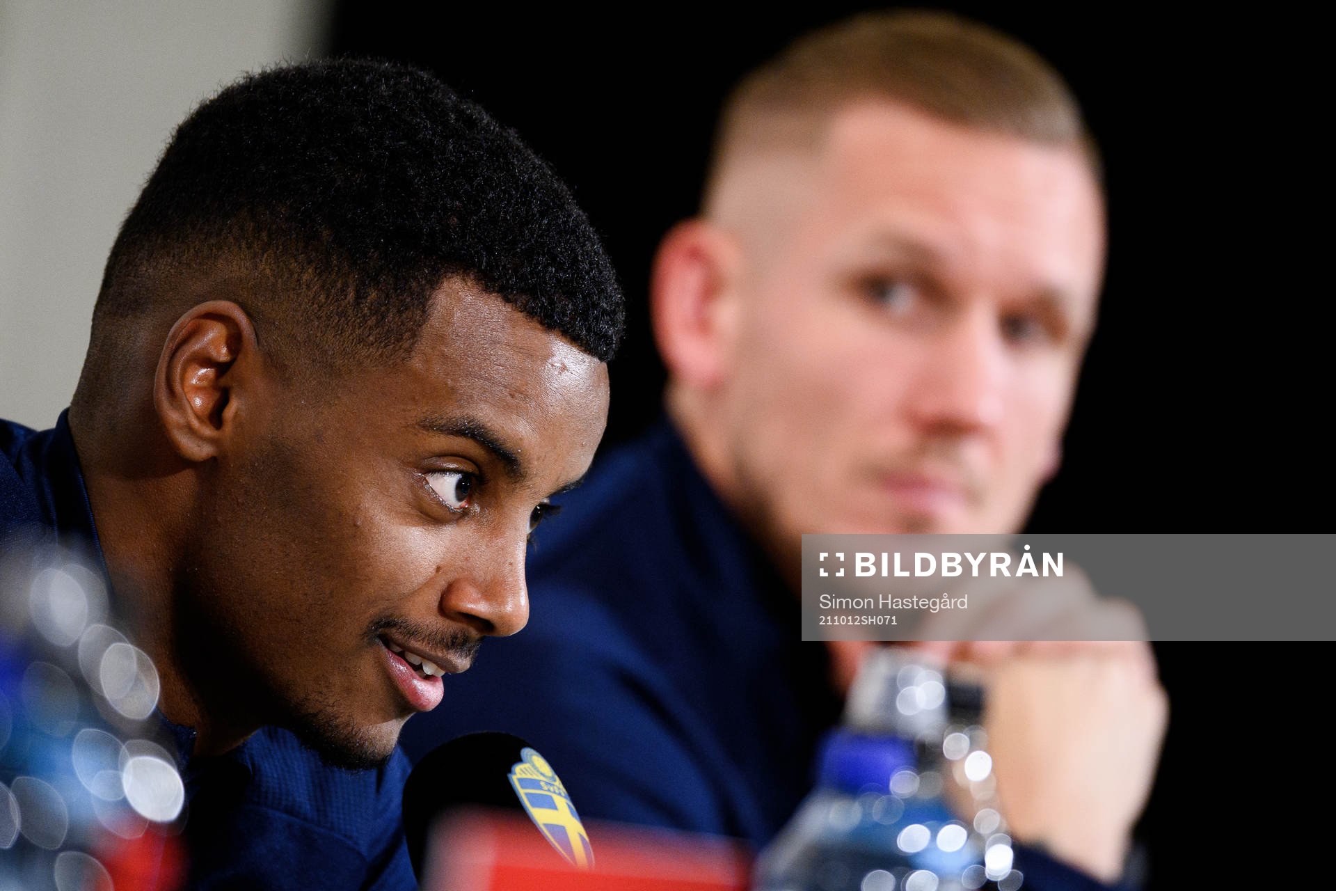 Alexander Isak and goalkeeper Robin Olsen of Sweden