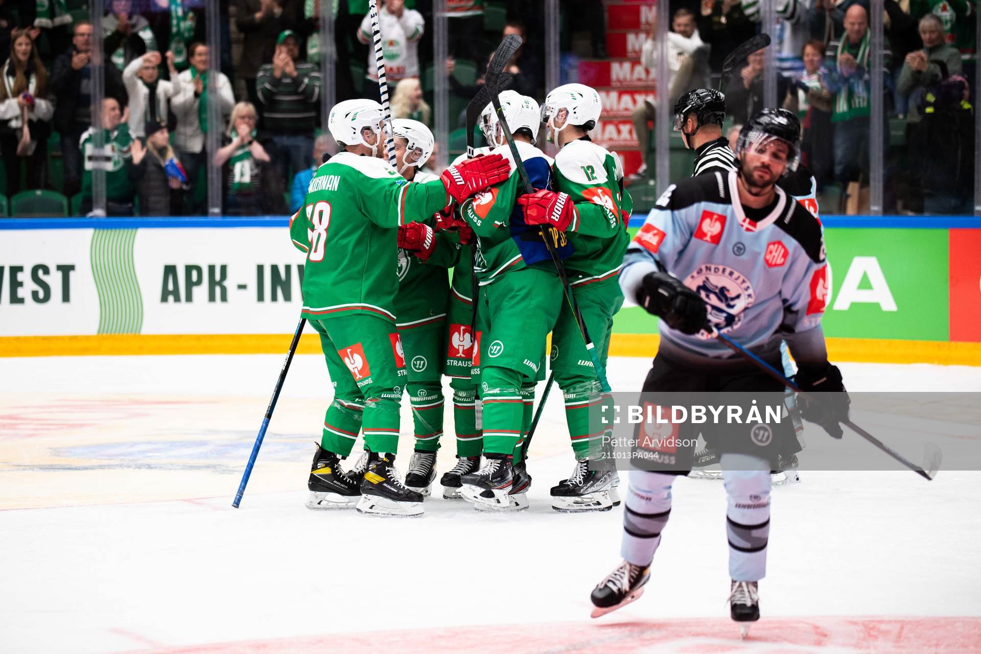 Linus Sjödin of Rögle celebrate with teammates
