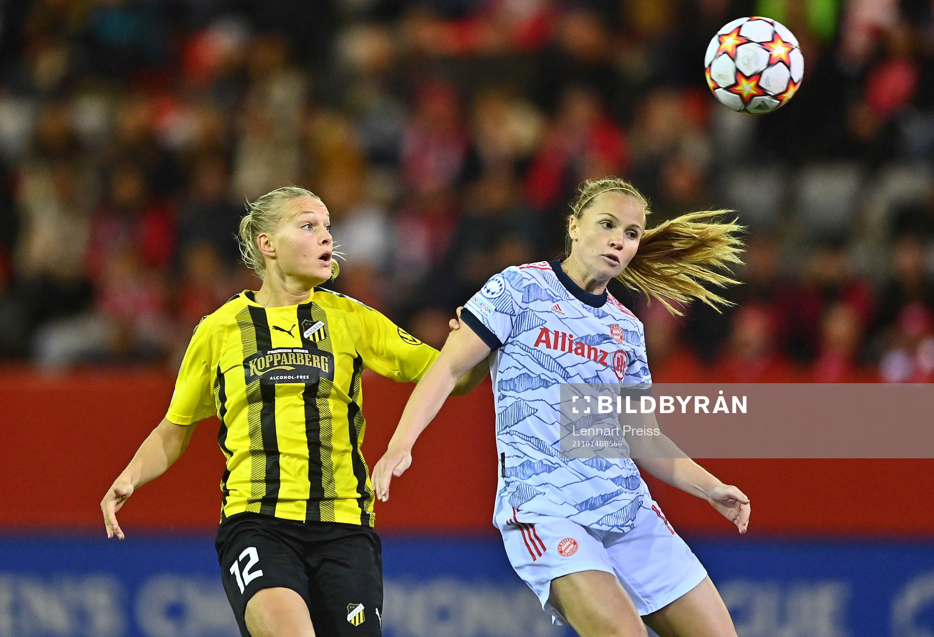 Glodis Perla Viggosdottir of Bayern Muenchen and Stine Larsen of Häcken during the UEFA Women's Champions League football match between Bayern Muenchen and Häcken on October 14, 2021 in Muenchen.