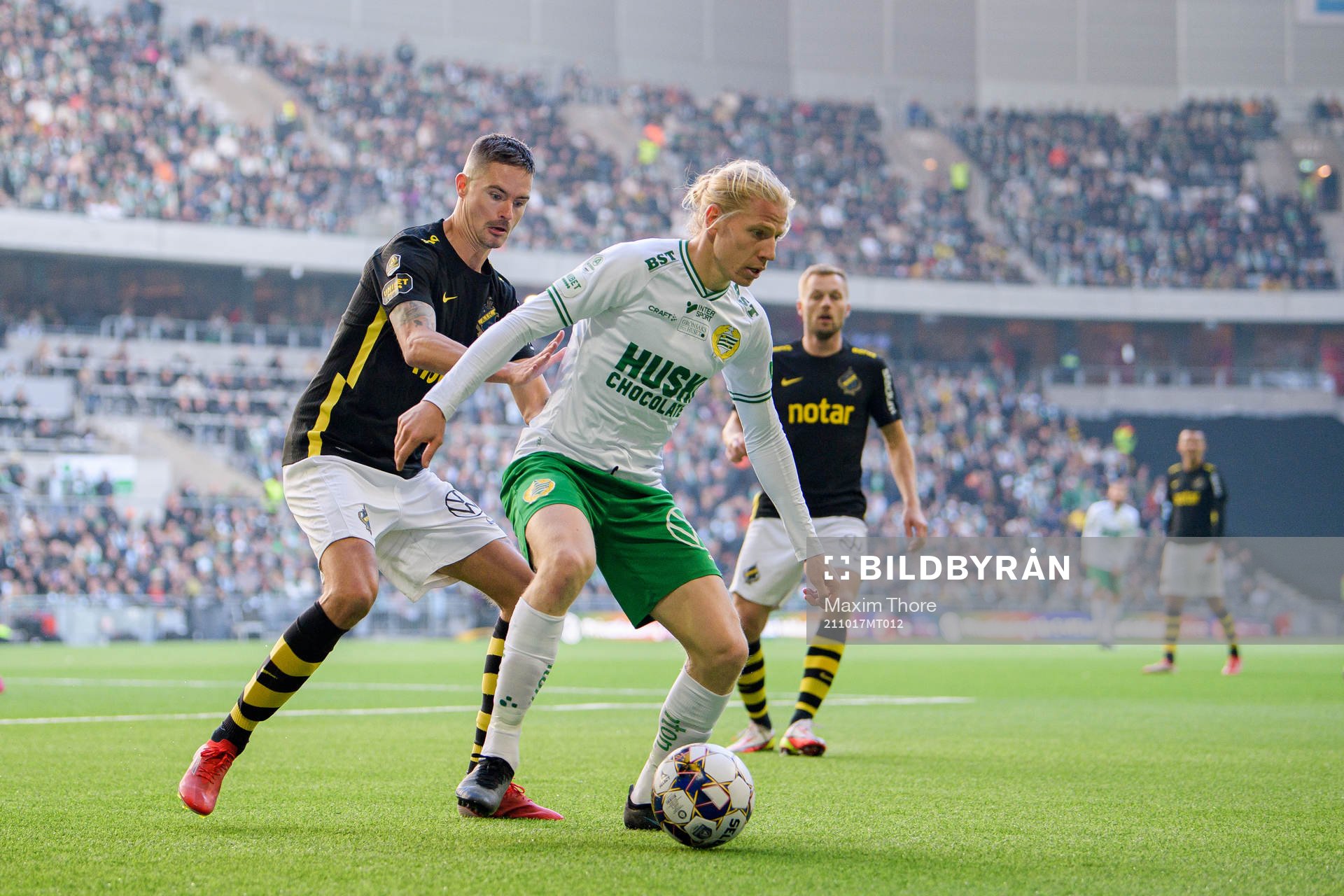 s Mikael Lustig och Hammarbys Gustav Ludwigson