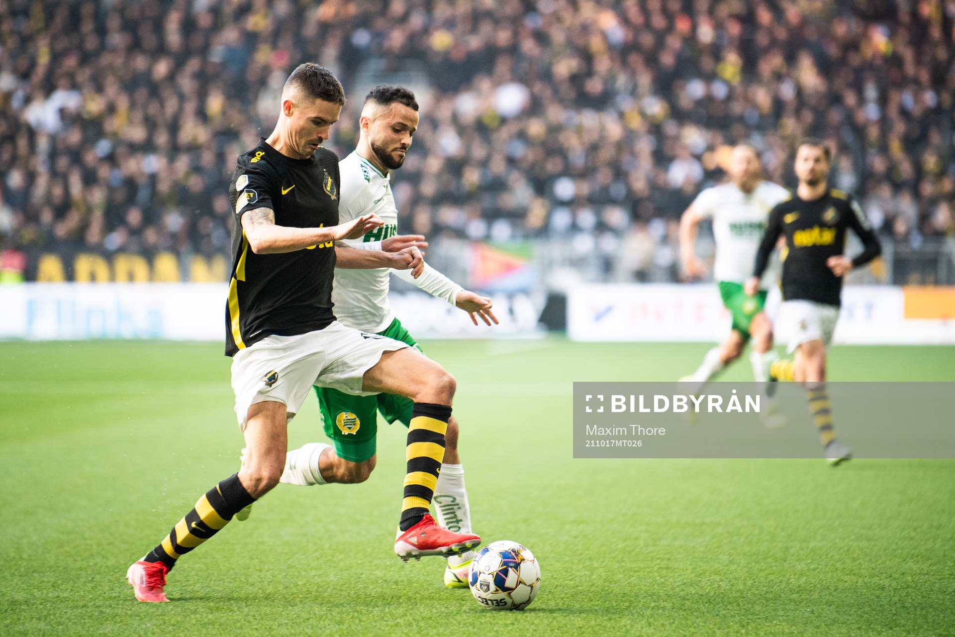 s Mikael Lustig och Hammarbys Mohanad Jeahze