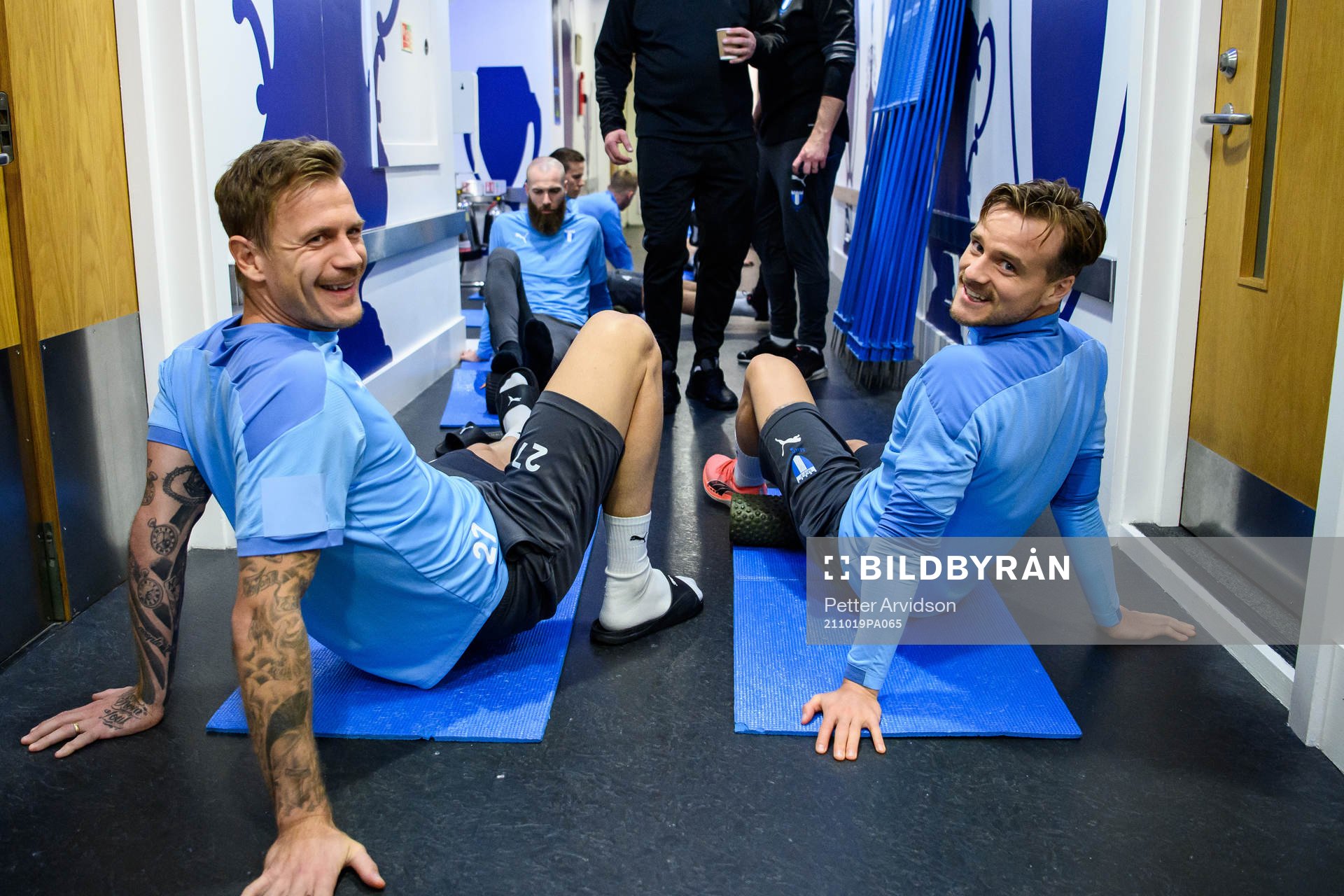goalkeeper Johan Dahlin and Eric Larsson of Malmö FF