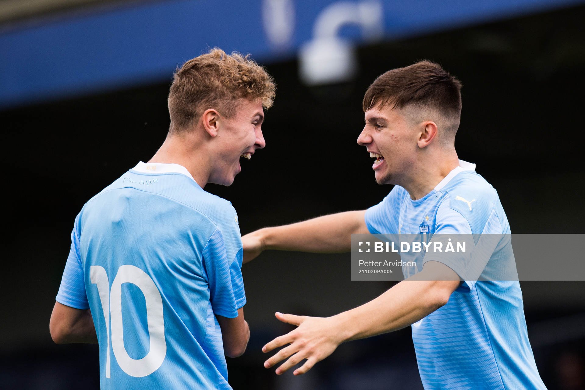 Isak Bjerkebo of Malmö FF (R) celebrate with Hugo Bolin (L) after scoring the 0-1 goal during the UEFA Youth League match between Chelsea and Malmö FF on October 20, 2021 in London.
