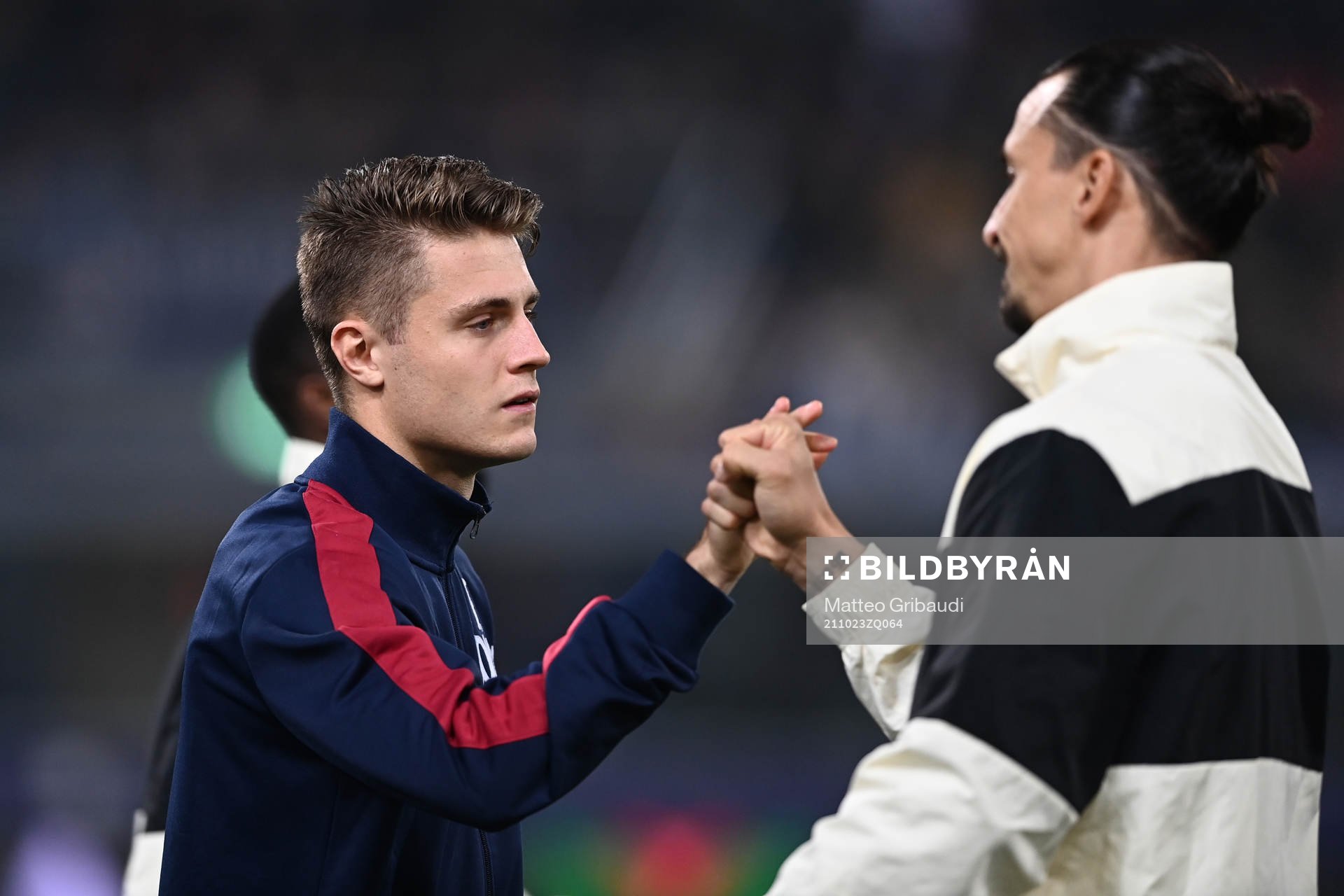 Zlatan Ibrahimovic of Milan and Mattias Svanberg of Bologna
