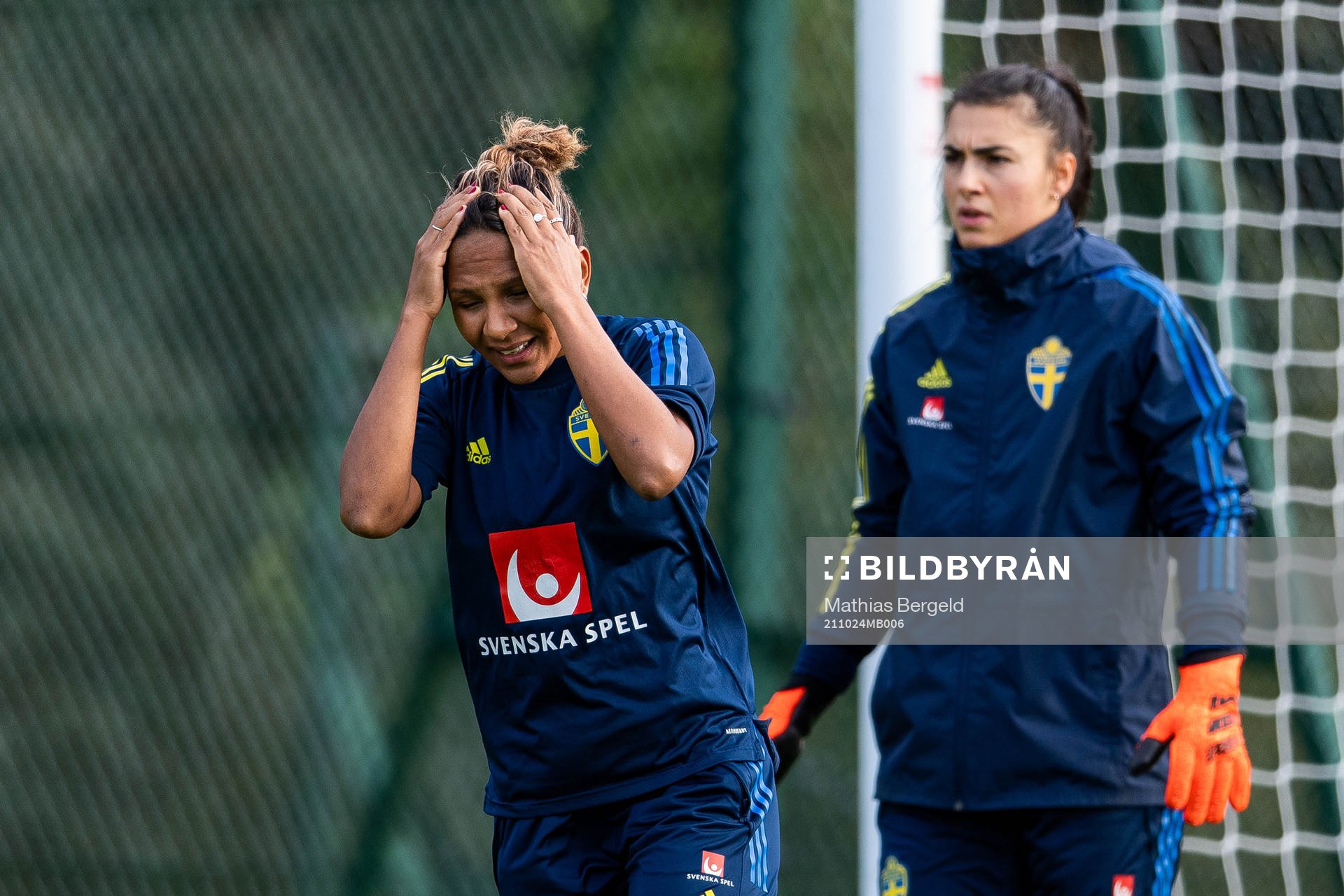 Madelen Janogy and goalkeeper Zecira Musovic of the Swedish