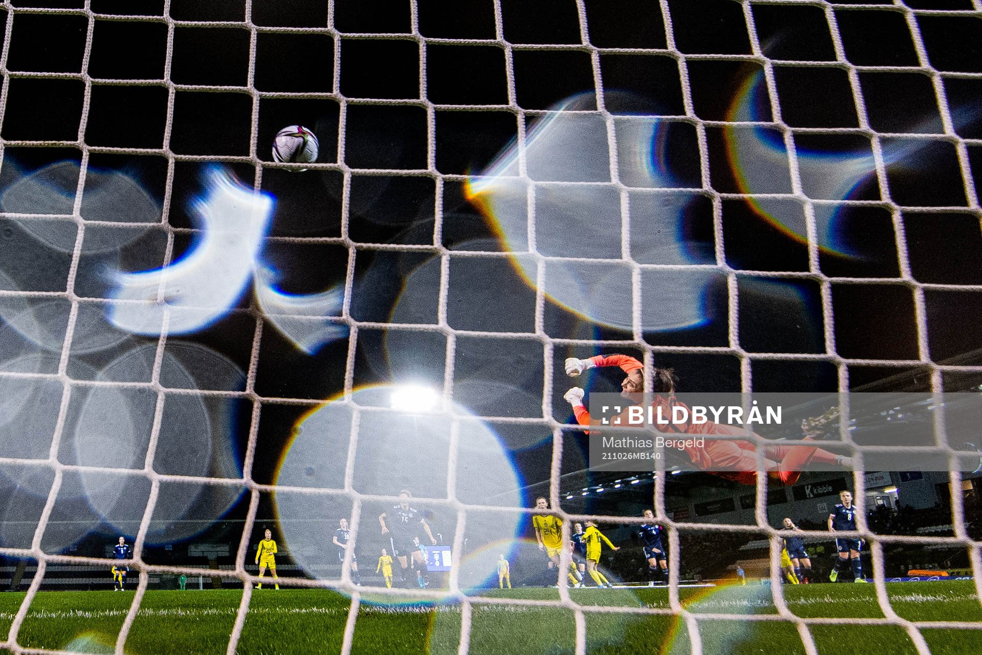 Fridolina Rolfö of Sweden scores 0-1 behind goalkeeper
