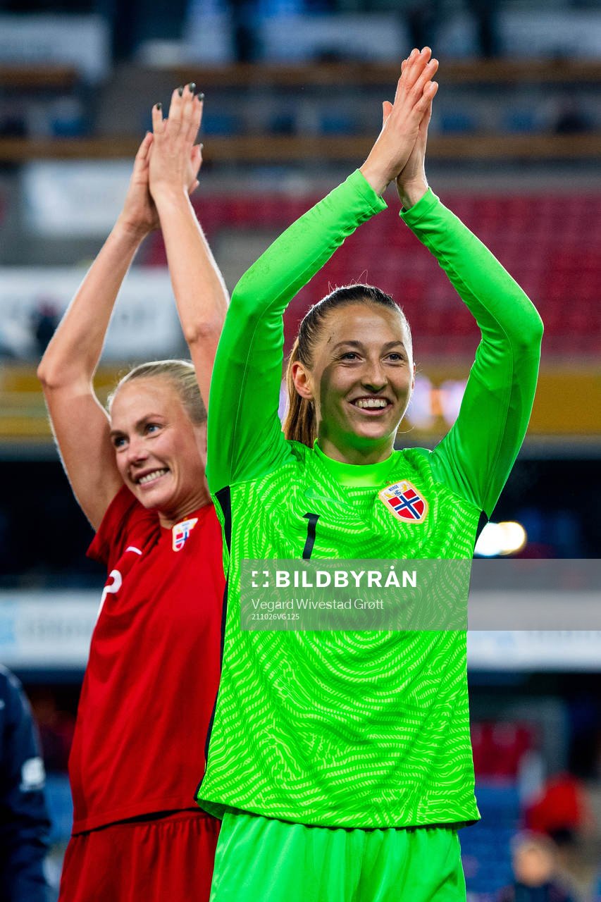 Guro Bergsvand and goalkeeper Cecilie Fiskerstrand of Norway celebrate after the FIFA Women's World Cup Qualifier football match between Norway and Belgium on October 26, 2021 in Oslo. 