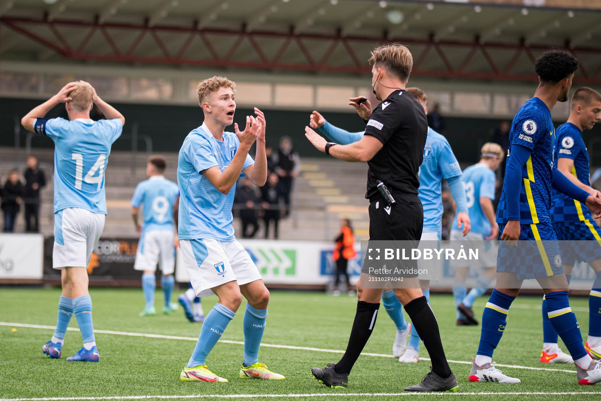 Hugo Bolin of Malmö FF reacts against referee Julian Weinberger during the UEFA Youth League match between Malmö FF and Chelsea on November 2, 2021 in Malmö.