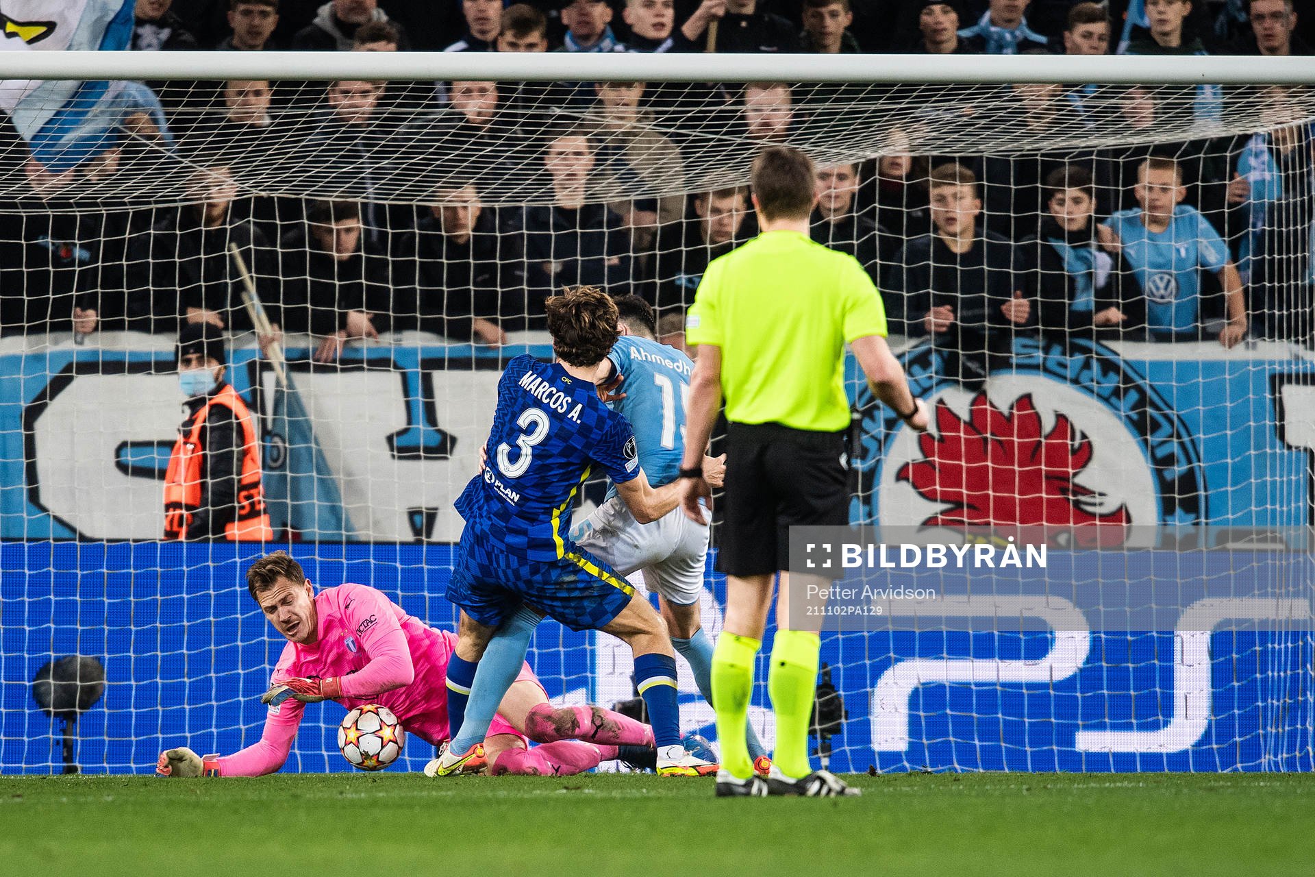 goalkeeper Johan Dahlin of Malmö FF and Marcos Alonso of Chelsea during the UEFA Champions League football match between Malmö FF and Chelsea on November 2, 2021 in Malmö.