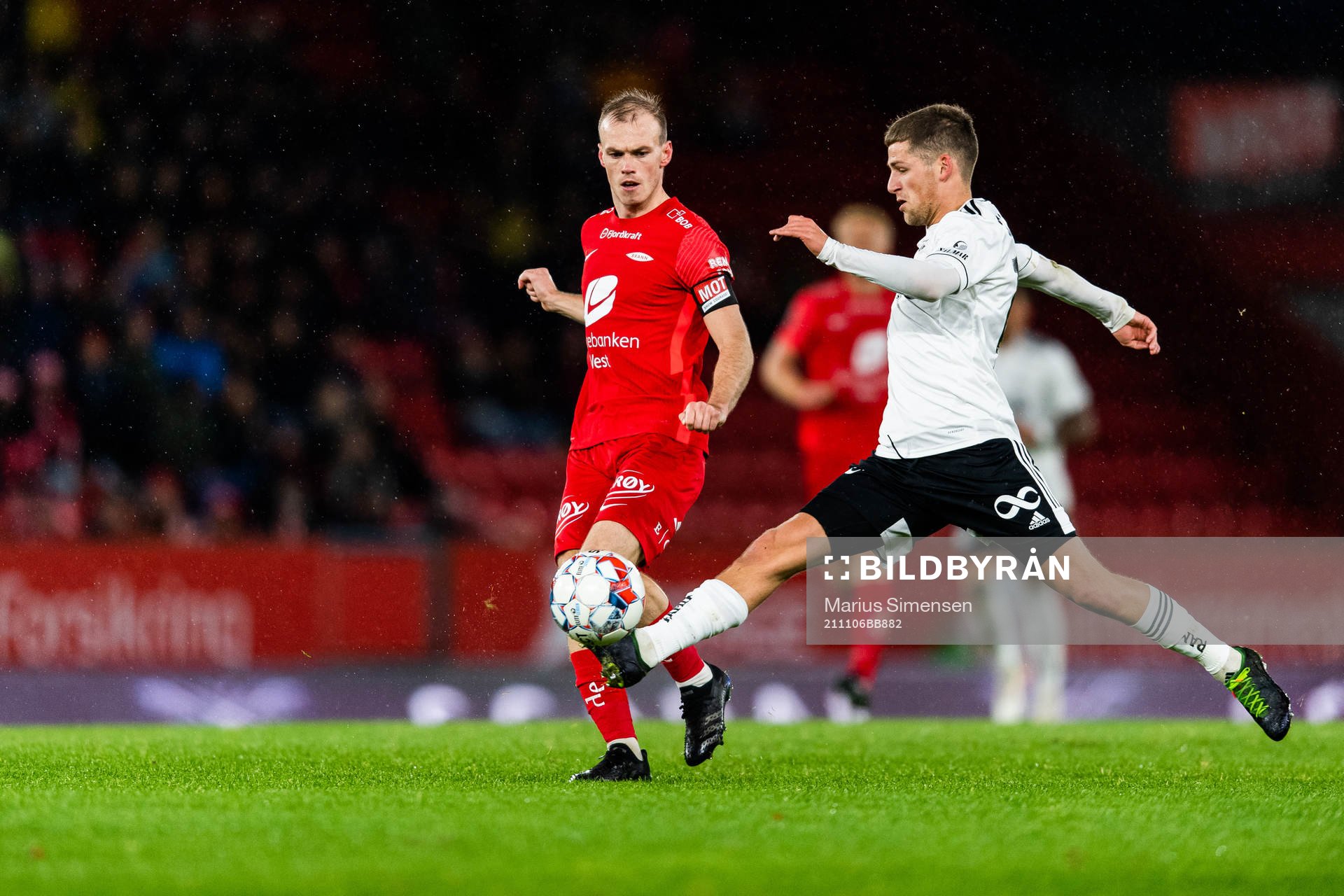 Petter Strand of Brann and Carlo Holse of Rosenborg