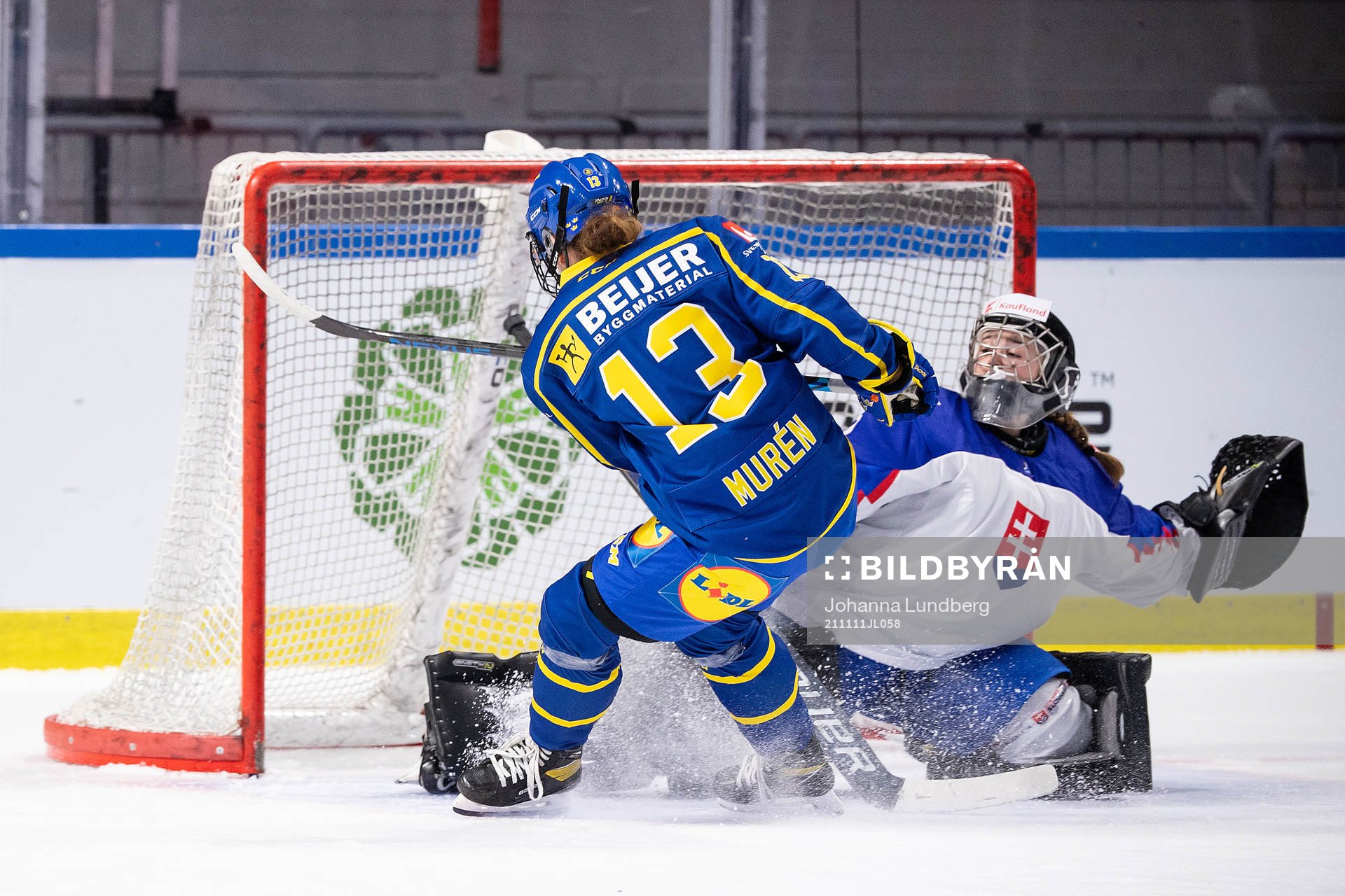 Emma Muren of Sweden and goalkeeper Nikola Zimkova of