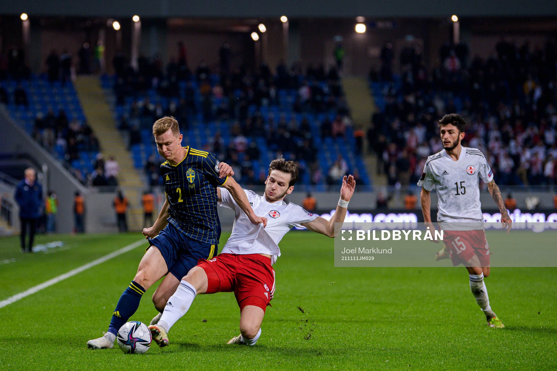Emil Krafth of Sweden against Khvicha Kvaratskhelia and