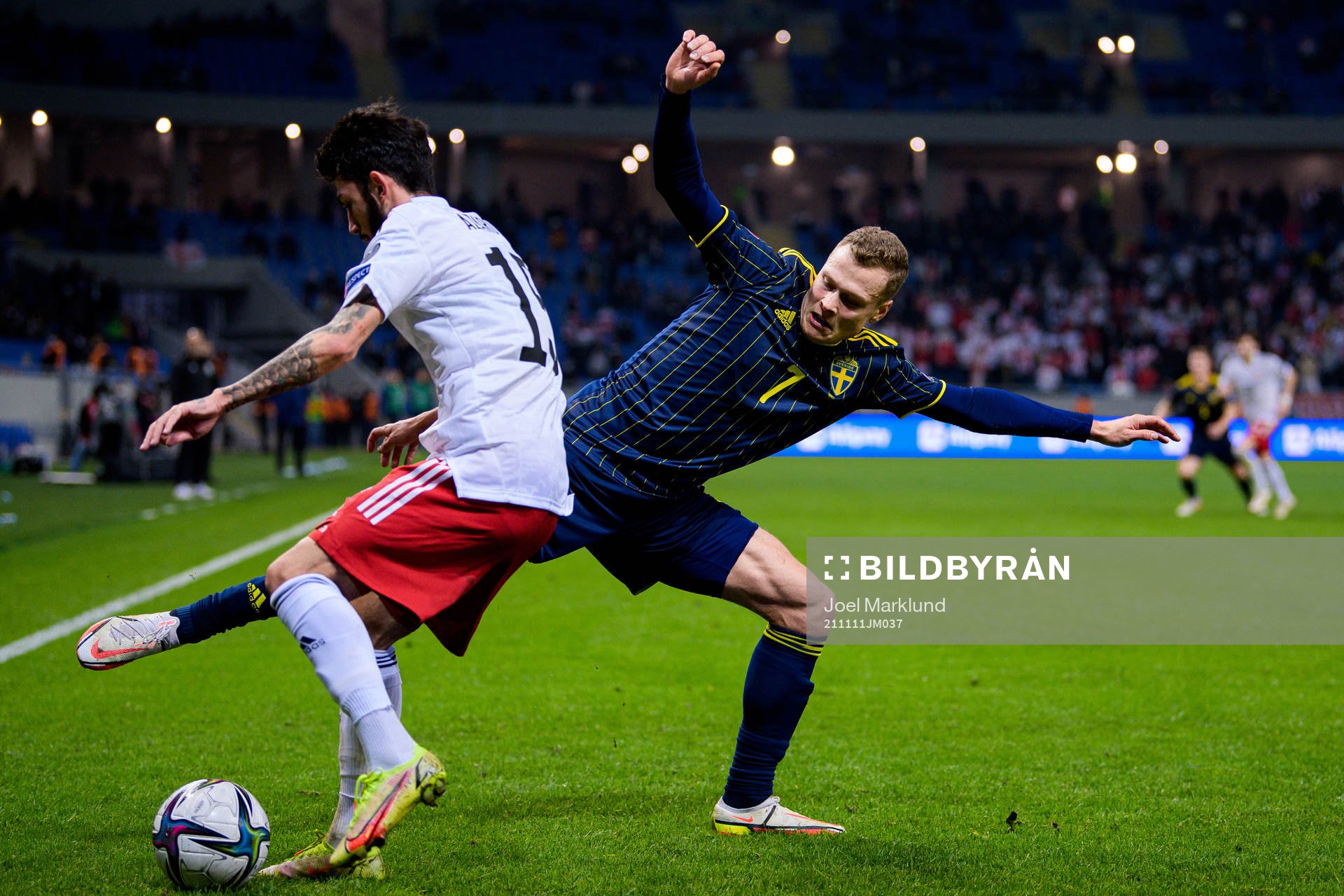 Irakli Azarov of Georgia and Viktor Claesson of Sweden during the FIFA World Cup Qualifier football match between Georgia and Sweden on November 11, 2021 in Batumi.