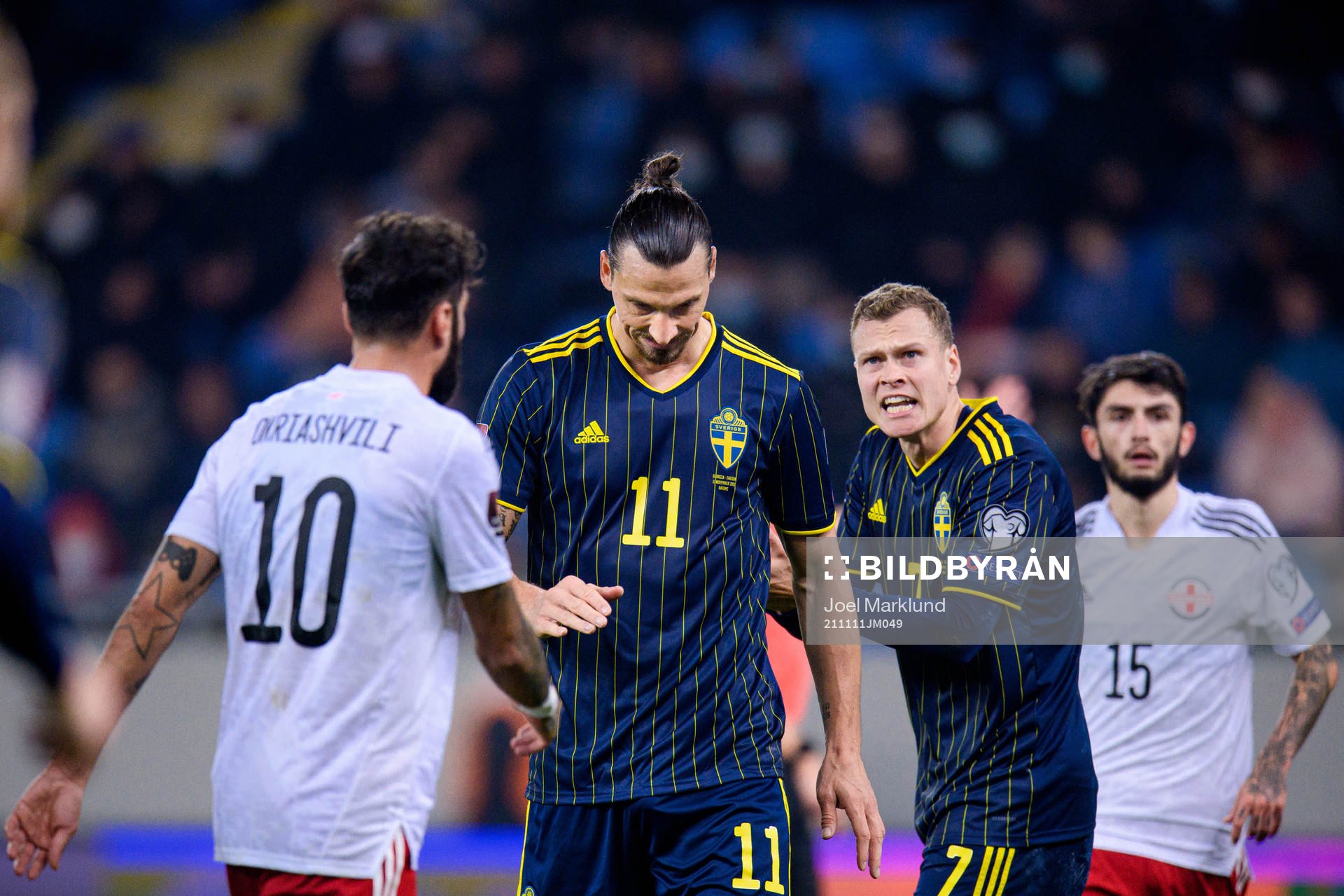 Zlatan Ibrahimovic and Viktor Claesson of Sweden reacts