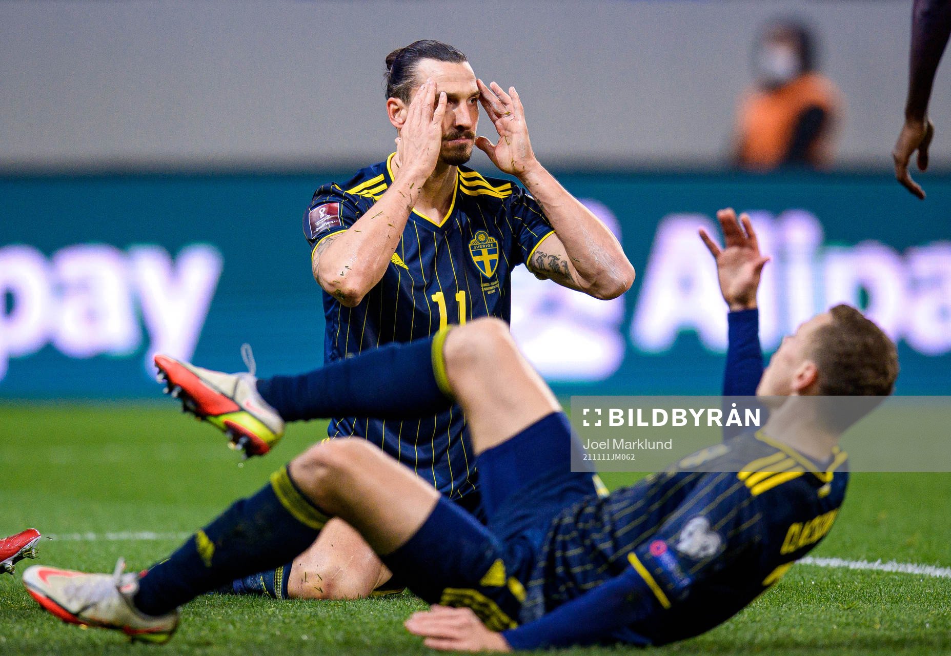 Zlatan Ibrahimovic and Viktor Claesson of Sweden reacts
