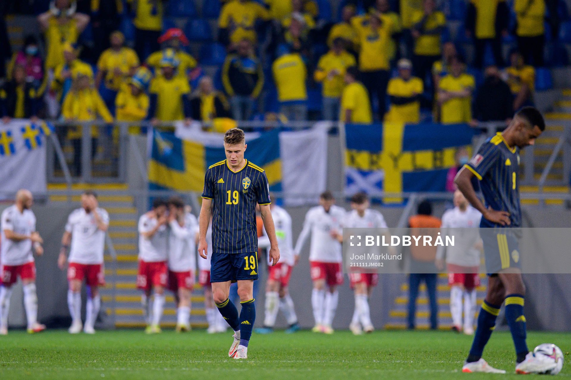 Mattias Svanberg and Alexander Isak of Sweden look dejected