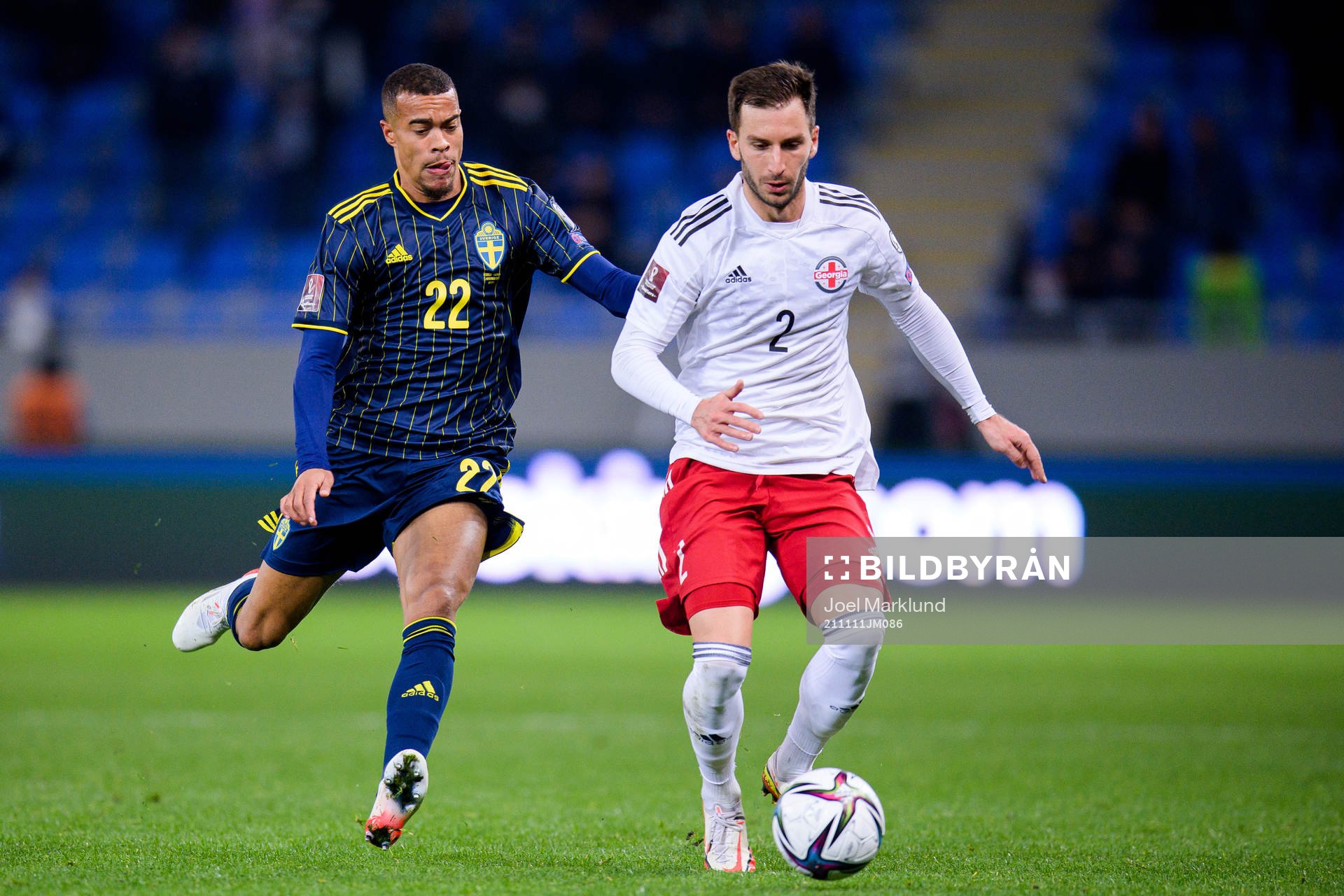 Robin Quaison of Sweden and Otar Kakabadze of Georgia