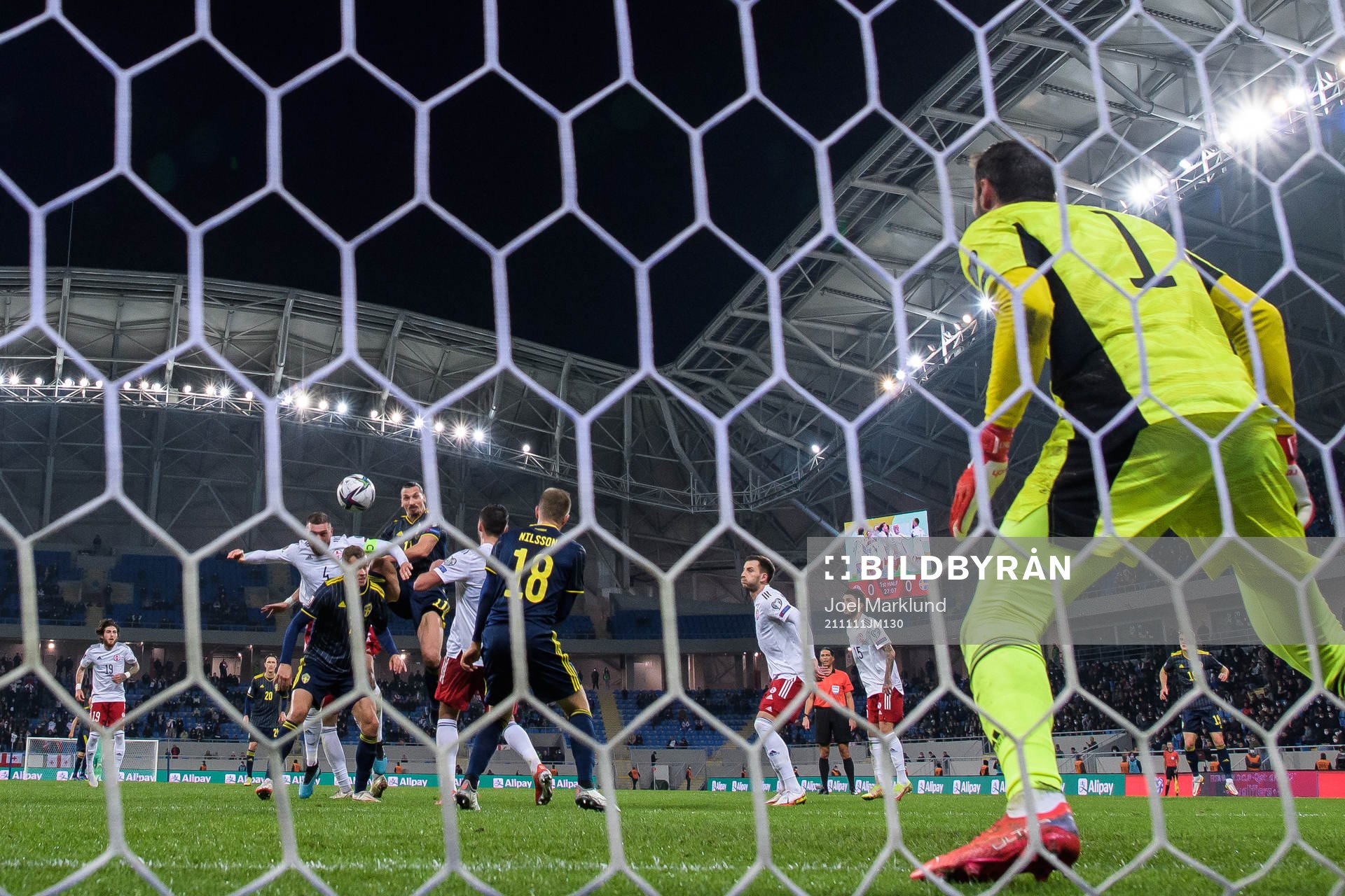 Guram Kashia of Georgia in action against Zlatan