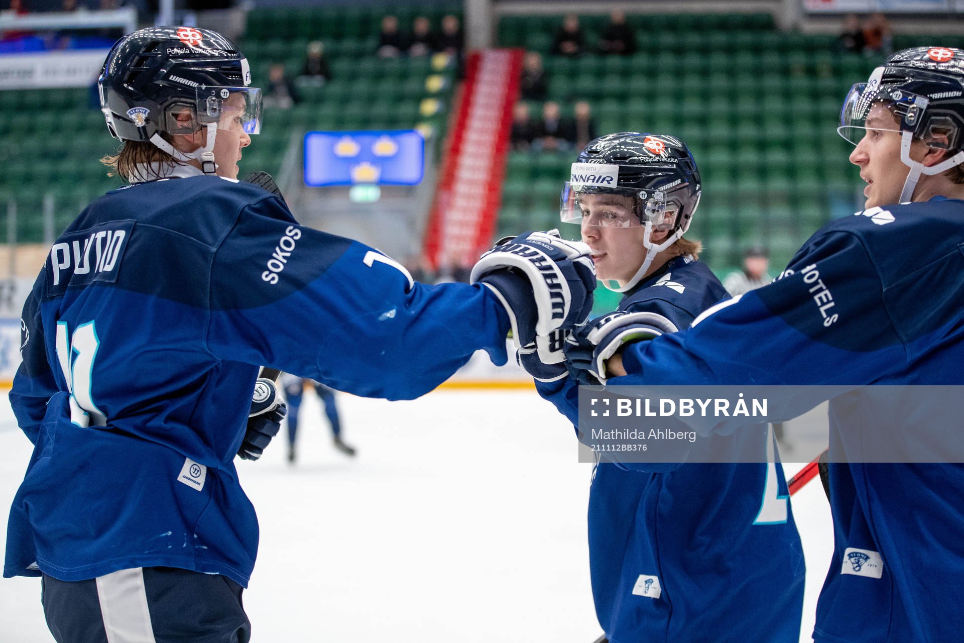 Kasper Puutio of Finland celebrates with teammates