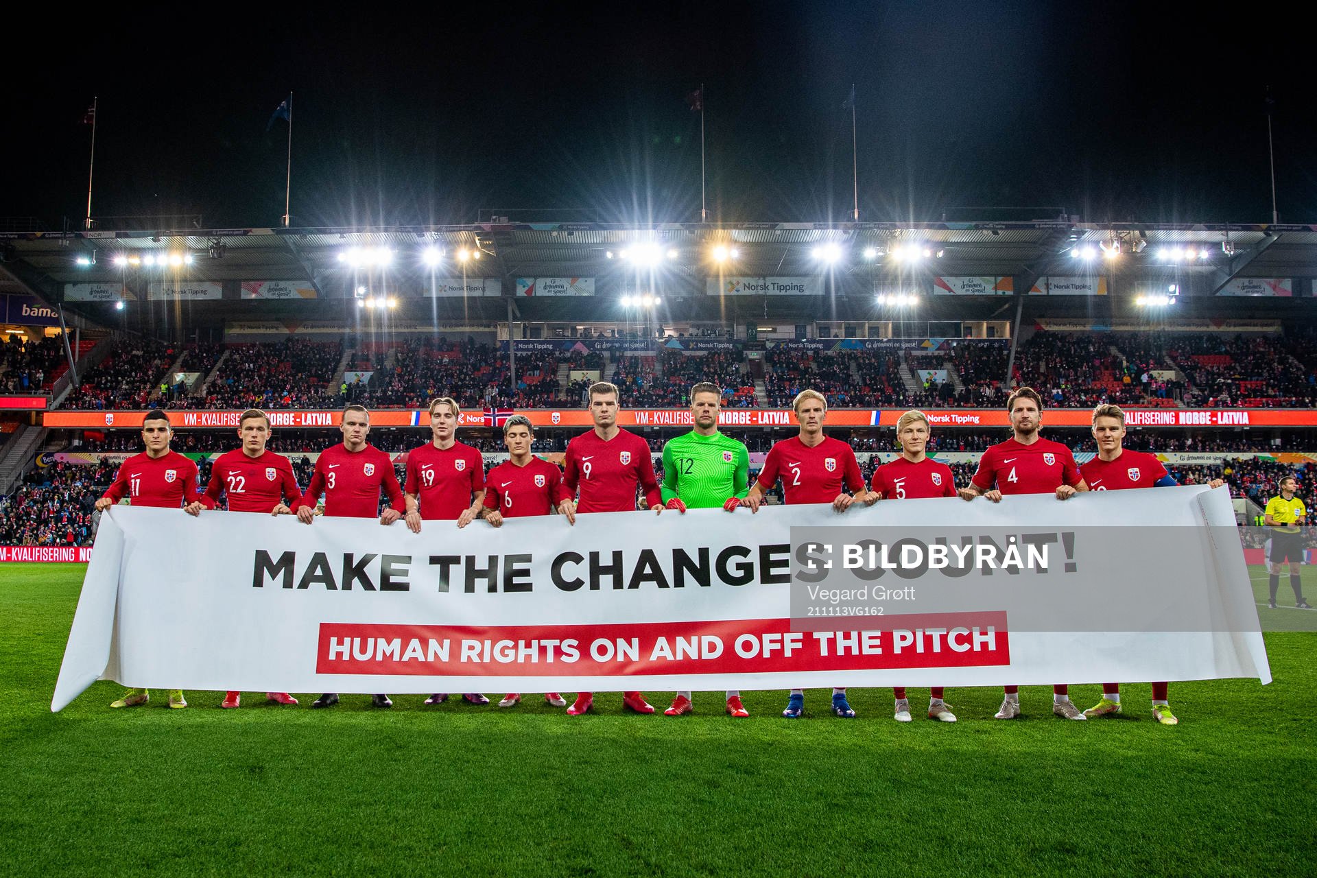 The starting eleven of Norway pose for a team photo holding