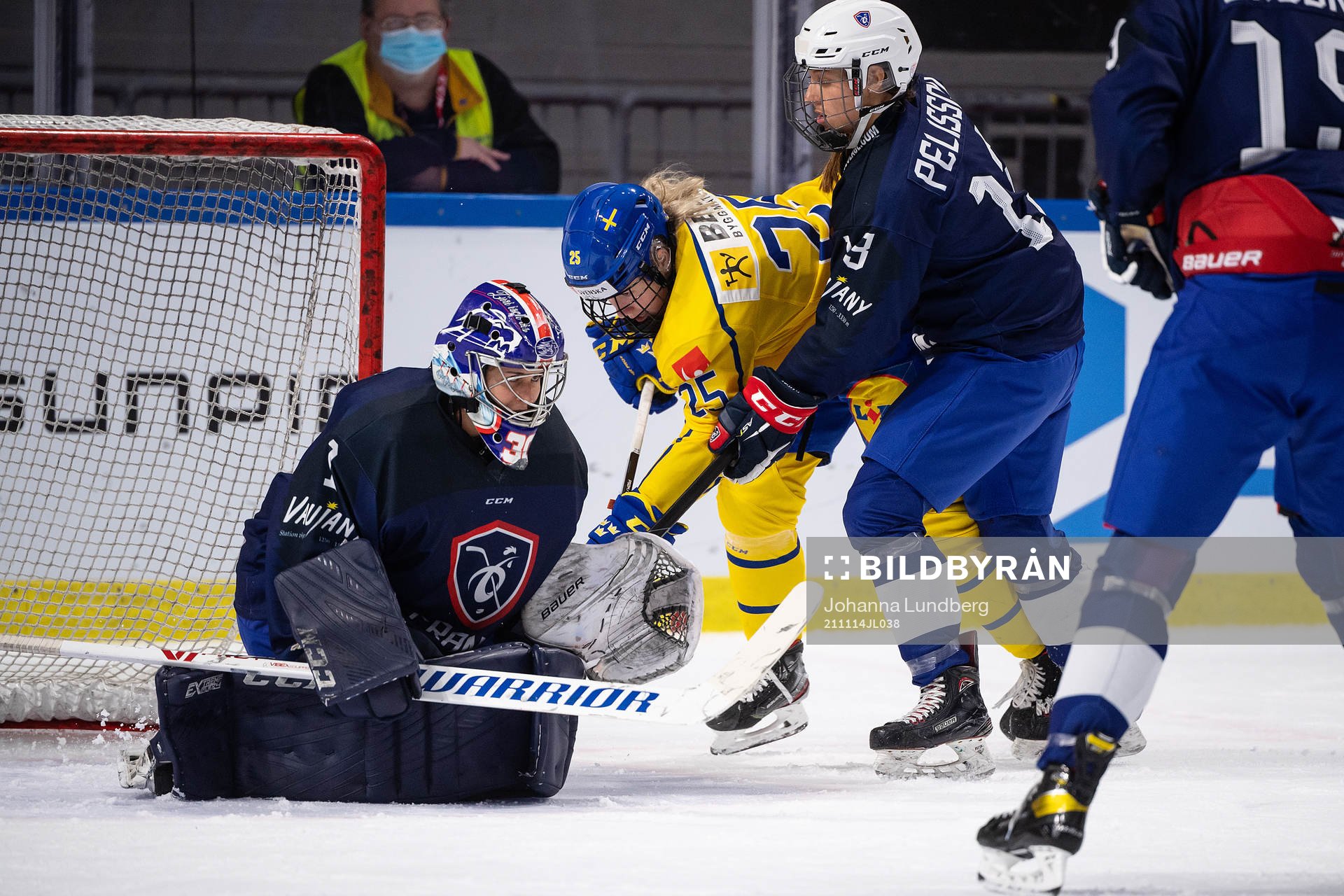 Lina Ljungblom of Sweden and goalkeeper Caroline Baldin of