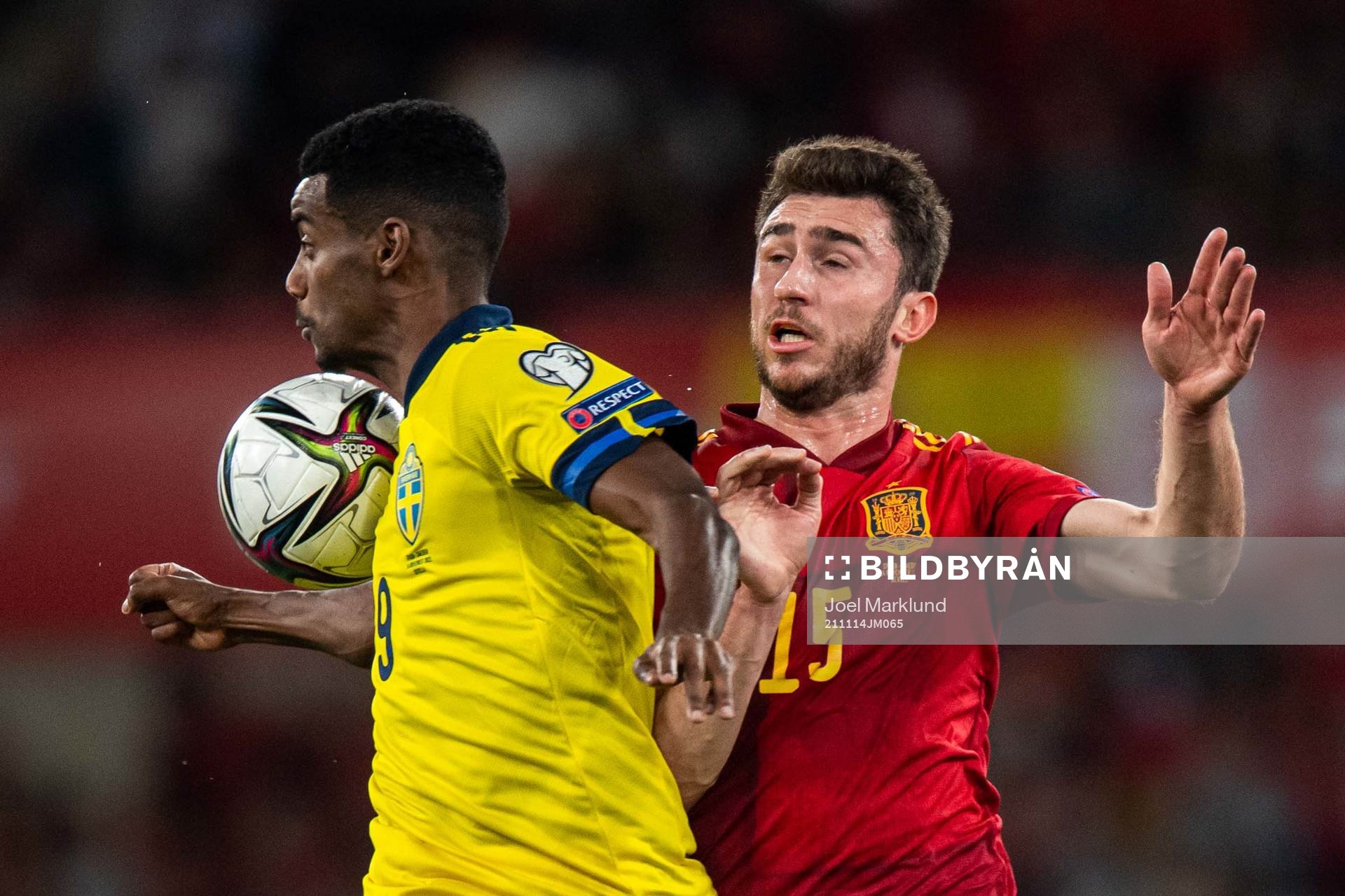 Alexander Isak of Sweden and Aymeric Laporte of Spain