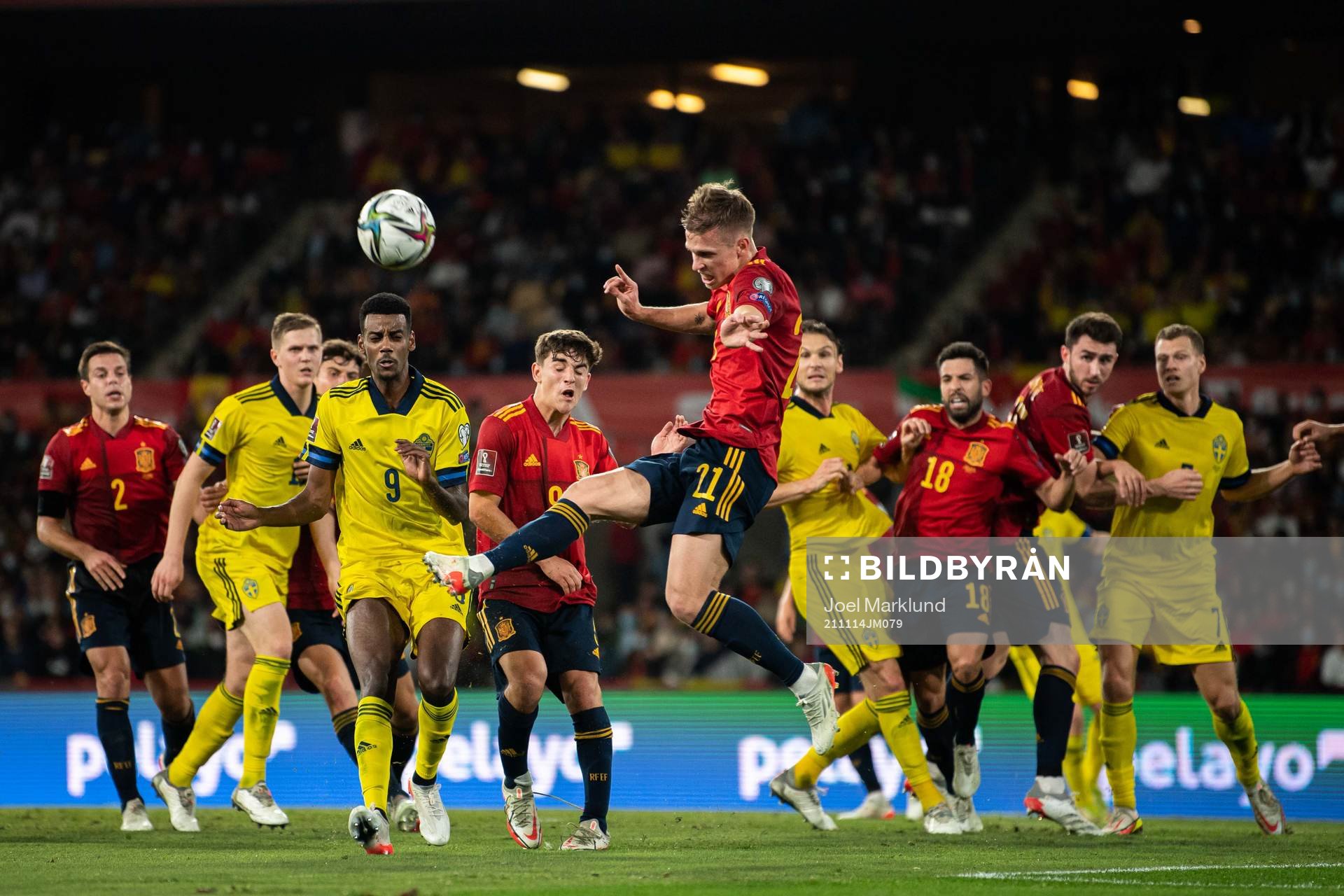 Alexander Isak of Sweden and Dani Olmo of Spain