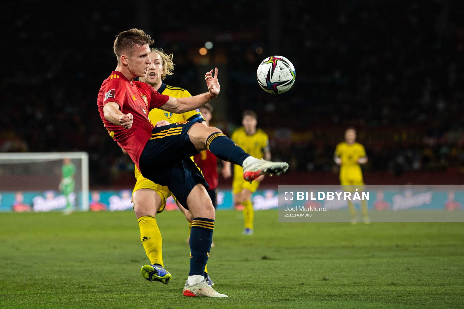 Dani Olmo of Spain and Emil Forsberg of Sweden
