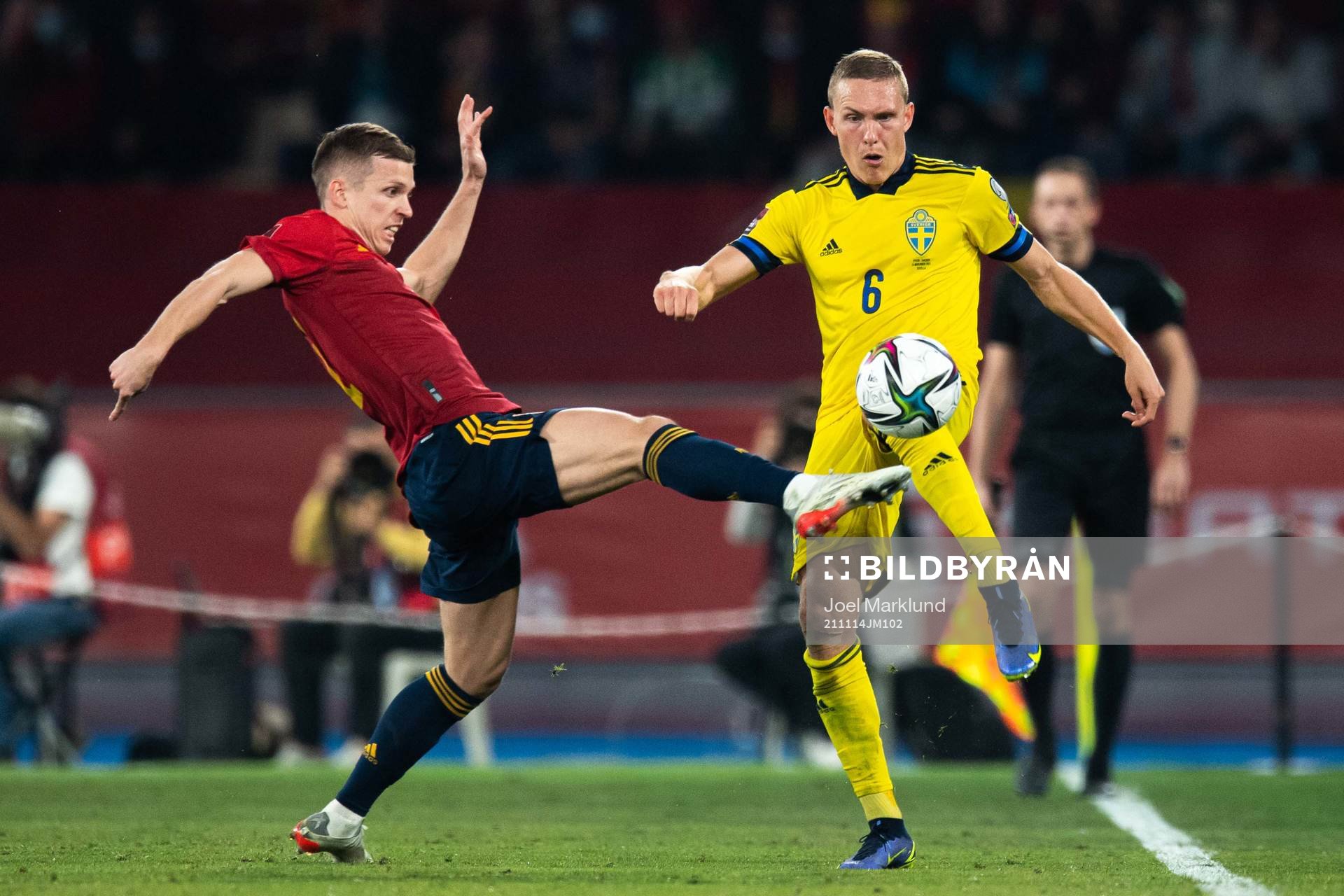 Dani Olmo of Spain and Ludwig Augustinsson of Sweden
