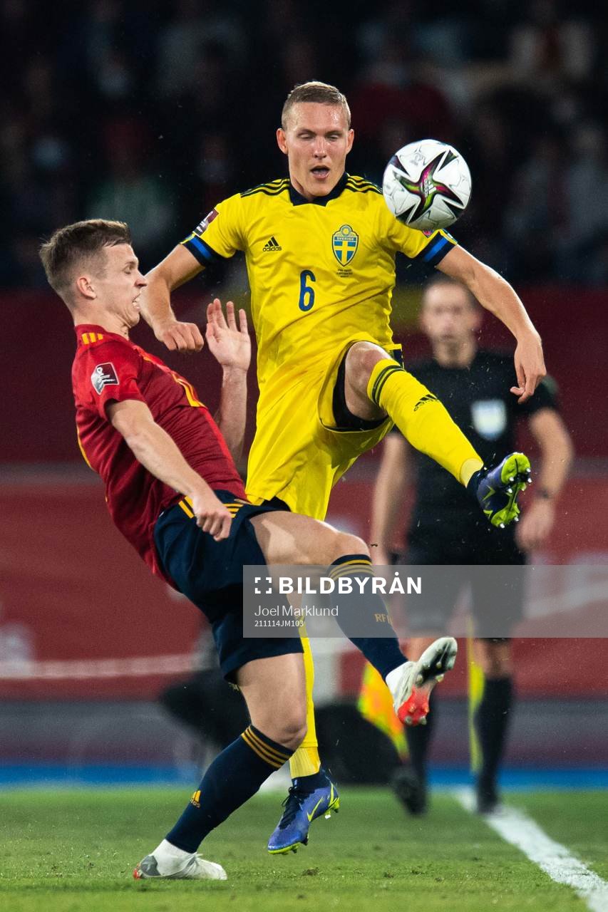 Dani Olmo of Spain and Ludwig Augustinsson of Sweden