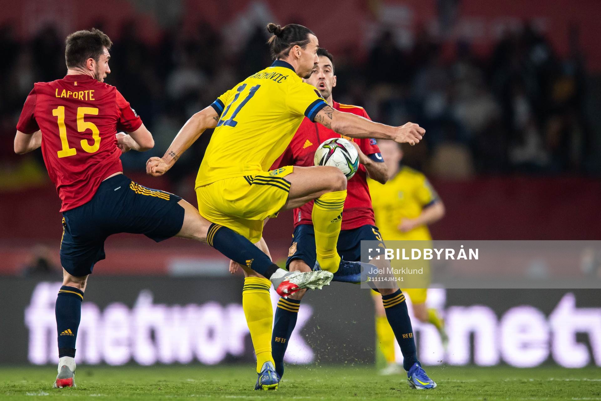 Aymeric Laporte of Spain and Zlatan Ibrahimovic of Sweden