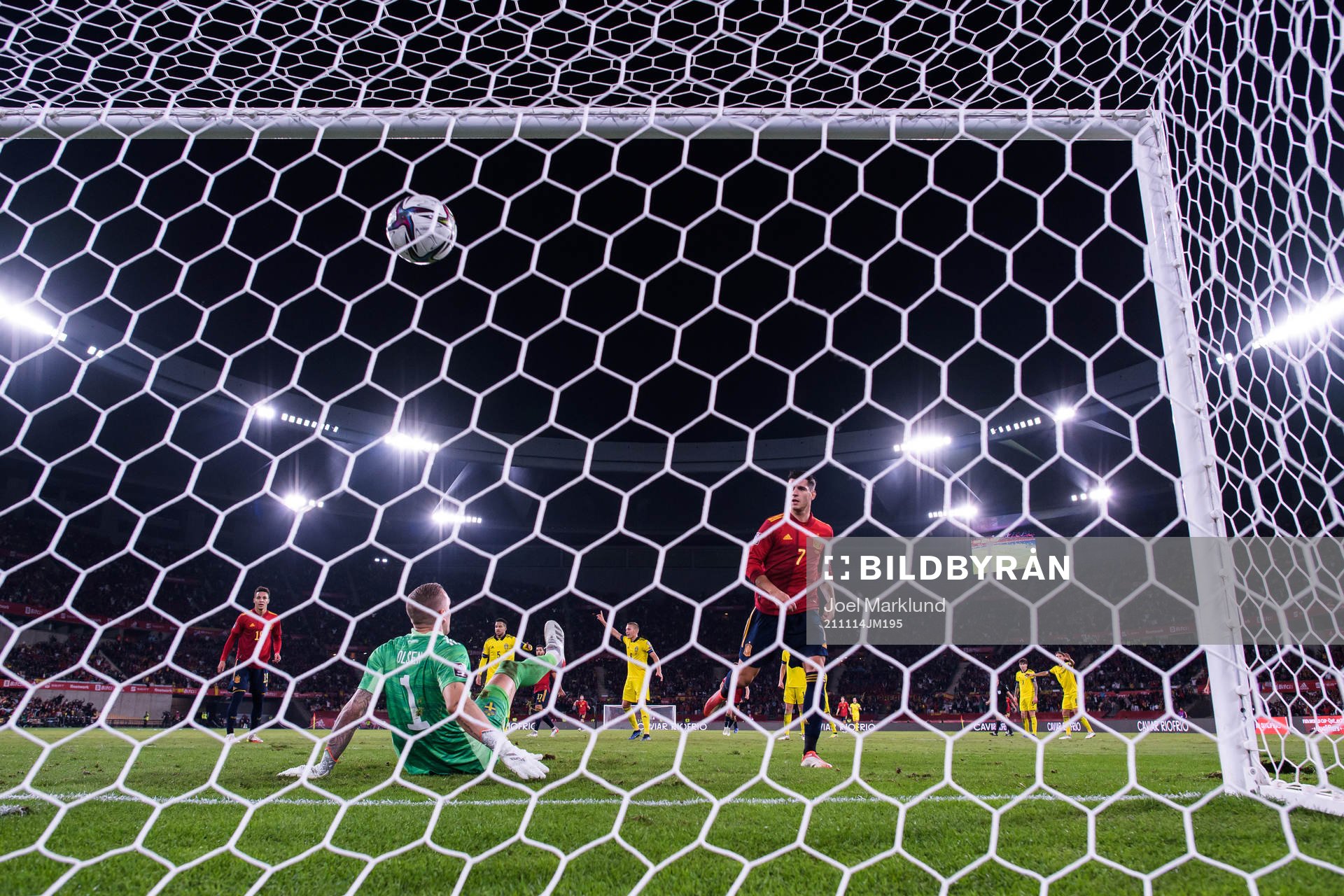 Alvaro Morata of Spain scores 1-0 behind goalkeeper Robin