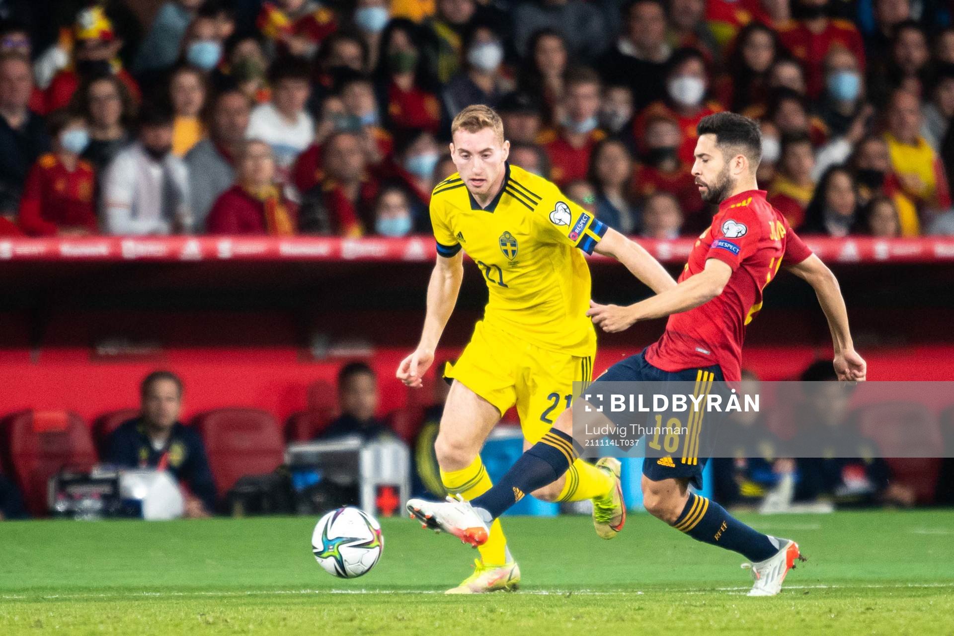 Dejan Kulusevski of Sweden and Jordi Alba of Spain