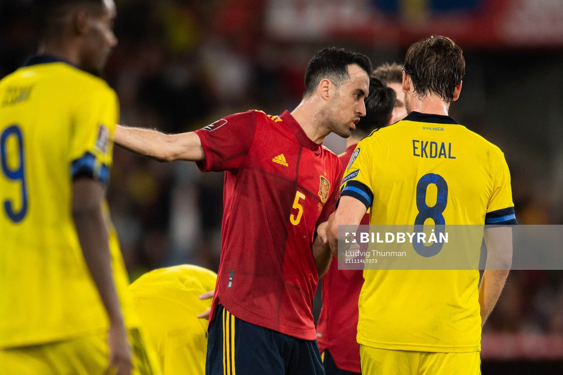 Sergio Busquets of Spain and Albin Ekdal of Sweden