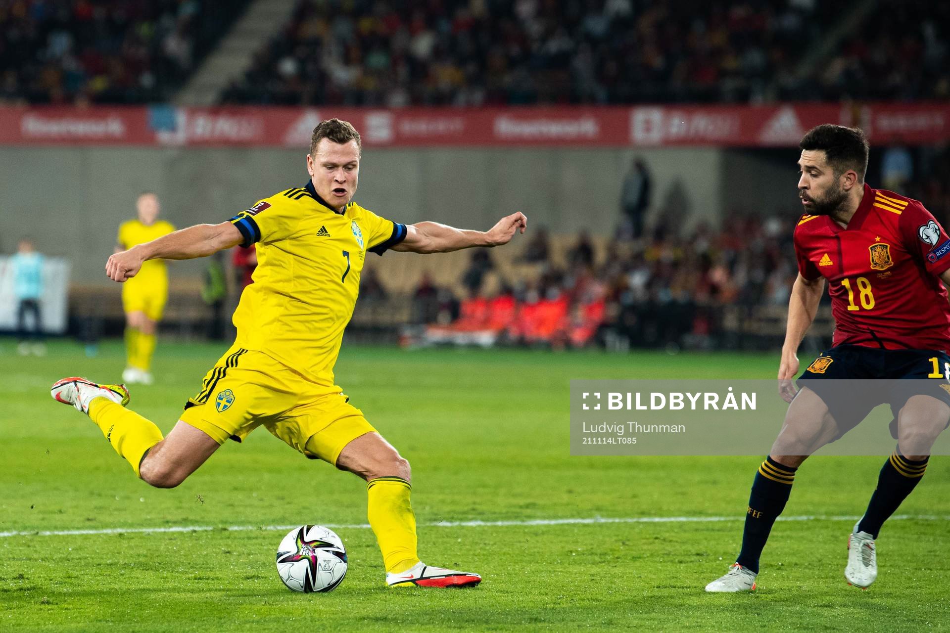Viktor Claesson of Sweden and Jordi Alba of Spain