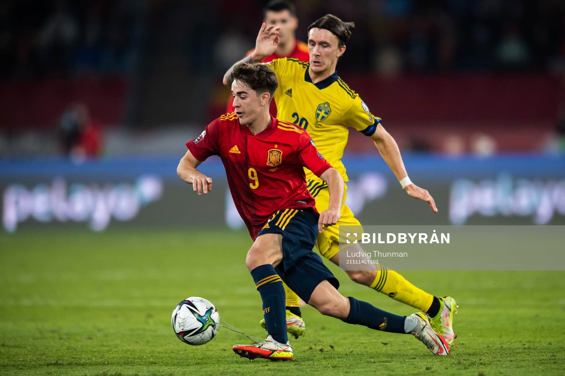 Gavi of Spain and Kristoffer Olsson of Sweden