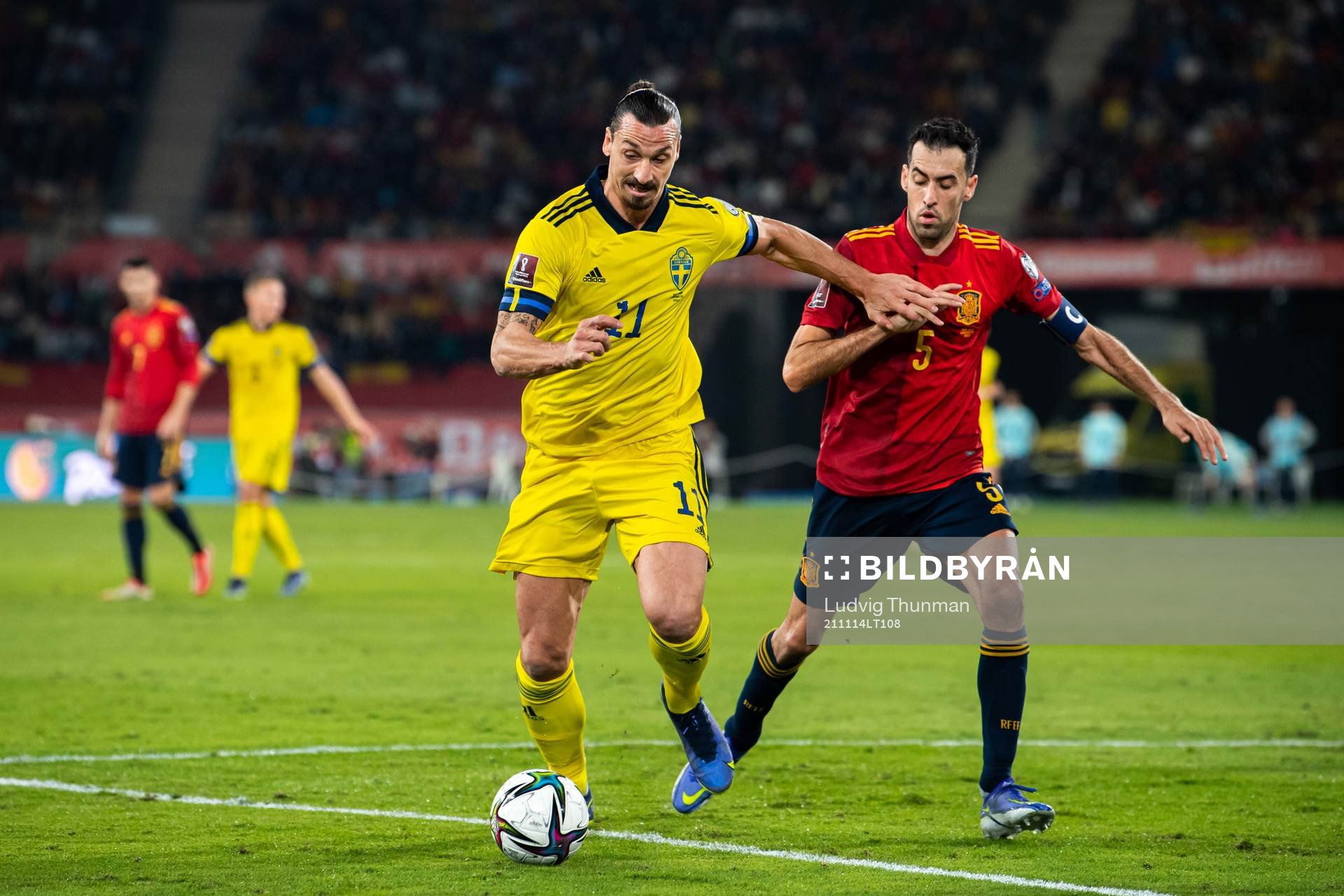 Zlatan Ibrahimovic of Sweden and Sergio Busquets of Spain